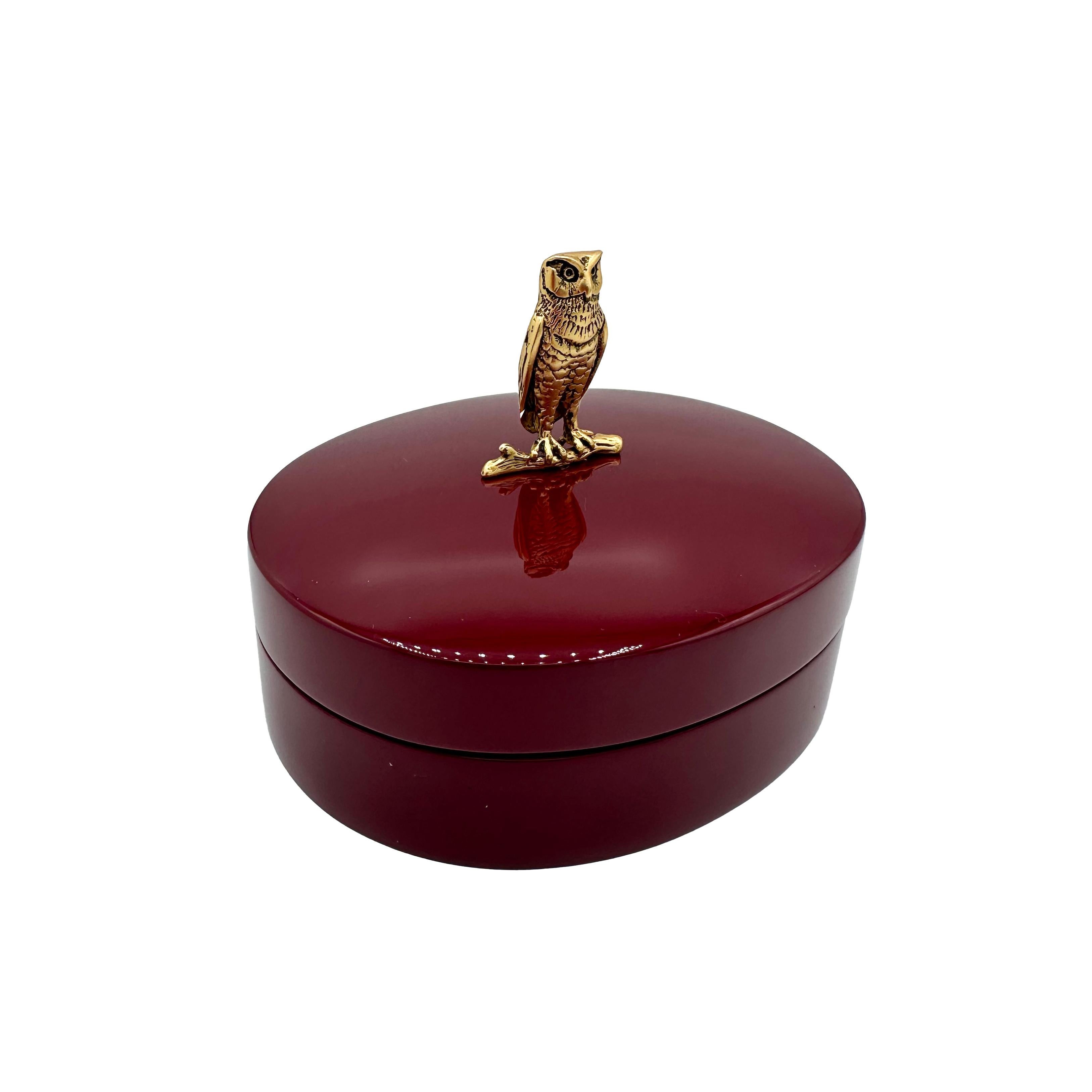 Our Wise Box is like a Faberge's objects de virtu, yet wildly modern lacquer. The box is exquisitely made by The Lacquer Company especially for Janet Mavec in a rich teal or burgundy—for your dresser or desk. The hand cast owl is delicious in all