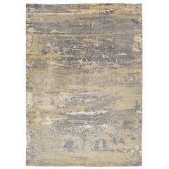 Tapis contemporain en laine et soie, fait à la main, de couleur beige, avec un motif abstrait
