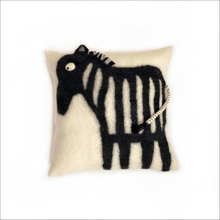 Meet Ziggy the Zebra.

A contemporary take on the wool-felting process, these individually handmade wool pillows from the studio of Chic Fusion, a female, South-African designer, are a whimsical and an eye-catching accessory to any space. The