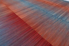 Kilim contemporáneo tejido a mano con técnica de tejido plano, de lana hilada a mano y con tintes naturales