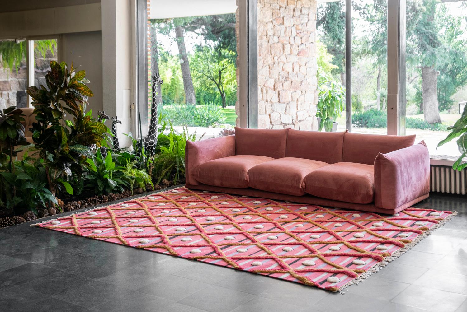 This rug has been ethically hand woven in the finest wool yarns by artisans in north of India, using a traditional weaving technique which defines the design.
This is a flat-weave rug but to highlight the design, part of the pattern is high