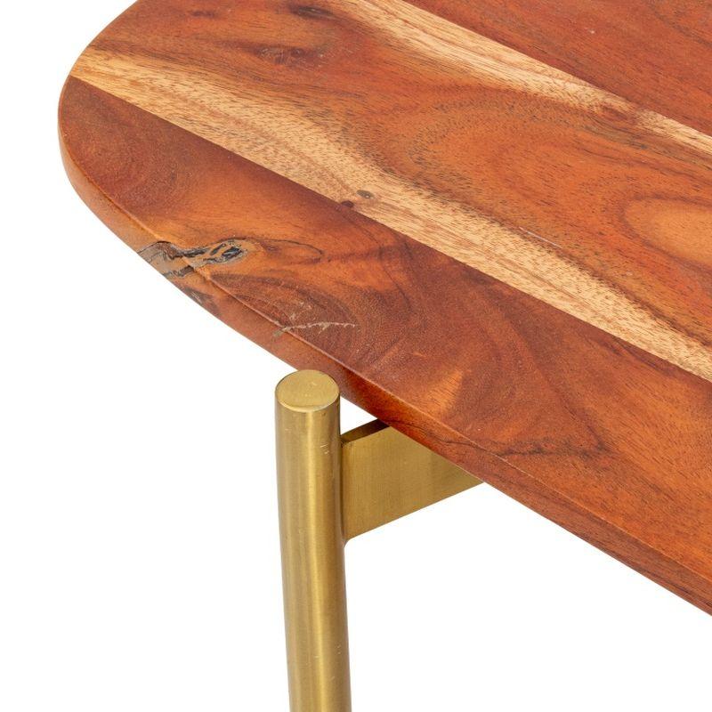 Table basse contemporaine en bois dur, sur quatre pieds en laiton. 14.5