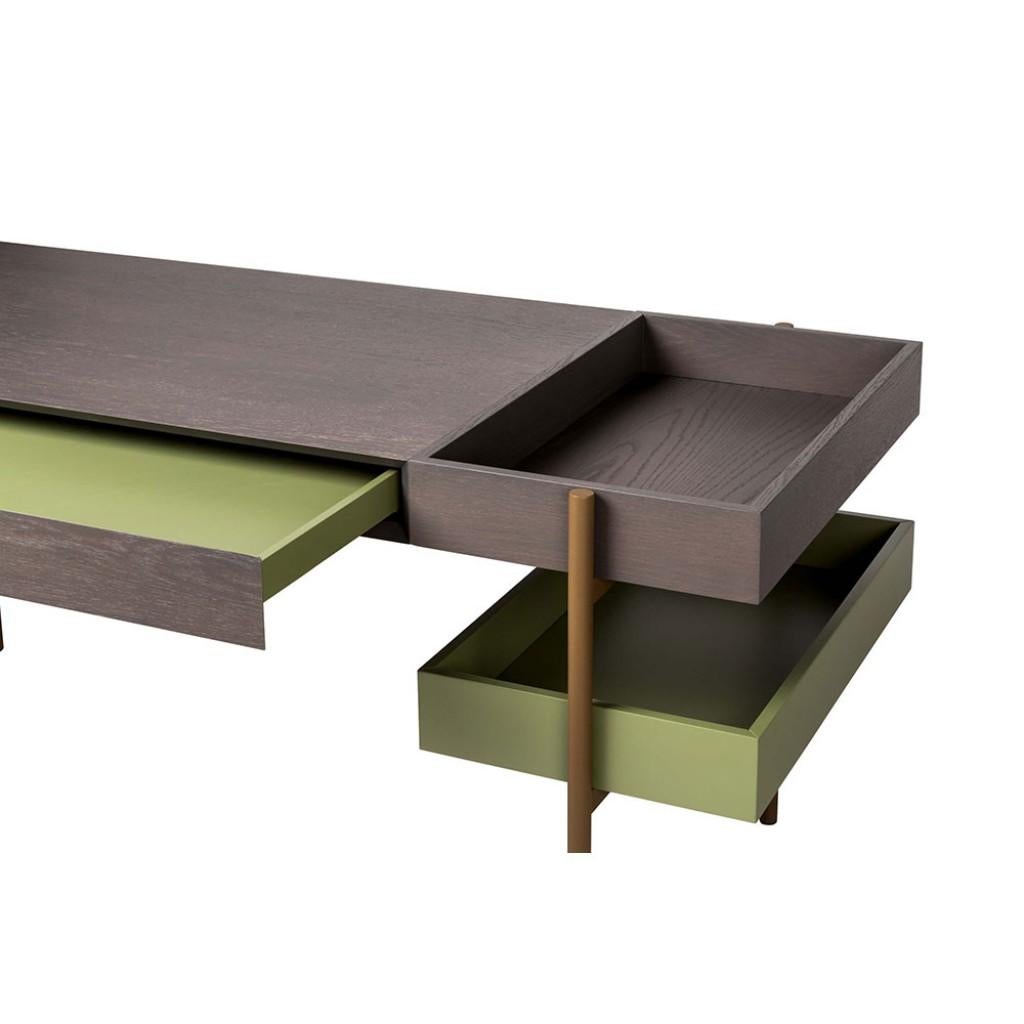 Home desk comes in two sizes and the top has one drawer and one extra open box. There is a second open box in lacquer and the base is metallic with powder coating in variety of colors.
Materials and Finishes: 
Wood: Oak, Walnut or smoked Eucalyptus