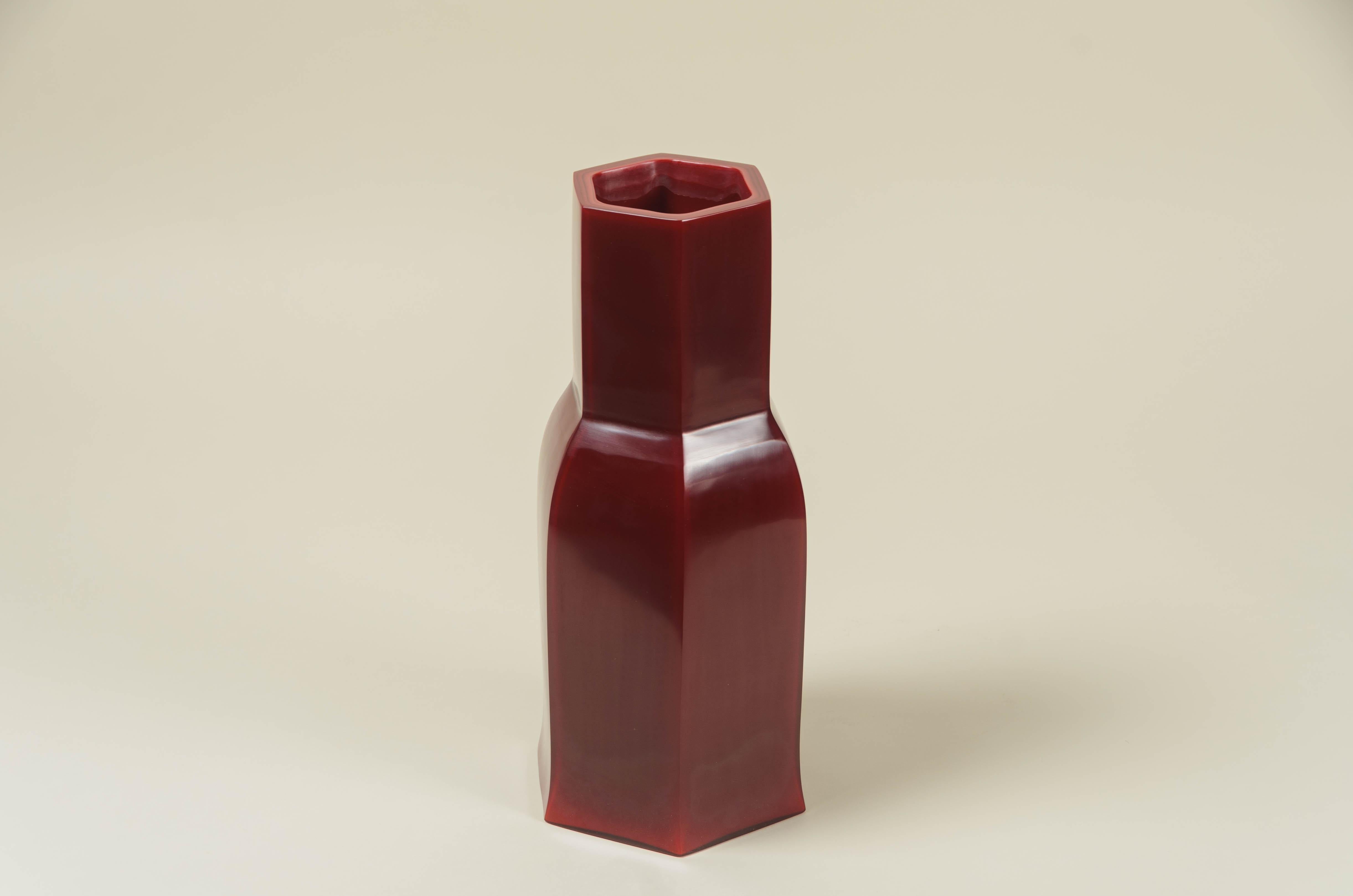 Hoof vase
Raspberry peking glass finish
Hand blown glass
Hand carved
Contemporary 
Limited Edition.

Peking glass refers to the high-quality glass art produced by the imperial and 
commercial workshops in Beijing during the Ching Dynasty,