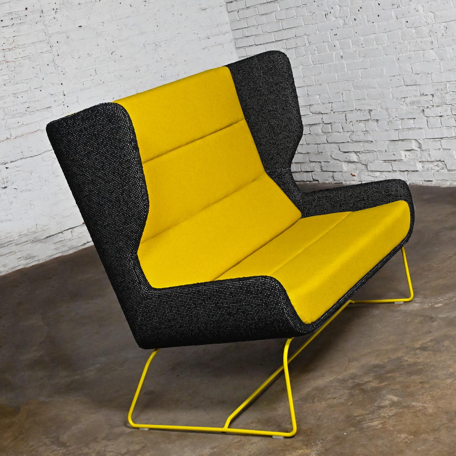 Fabulous Contemporary NaughtOne for Herman Miller Hush high wing back sofa or settee with yellow & black fabric and polyester powder coated yellow metal wire sled base, 3 available selling separately. Beautiful condition, keeping in mind that these