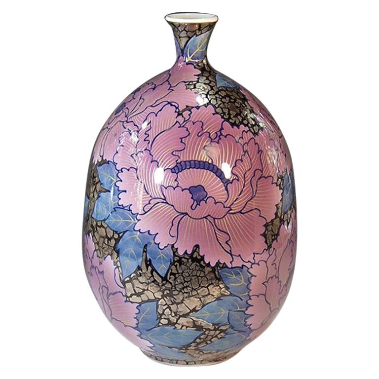 Elegant contemporary decorative porcelain vase, hand-painted in vivid pink and blue on an elegantly shaped porcelain body against a striking platinum background, a signed piece by highly acclaimed Japanese master porcelain artist in the Imari-Arita