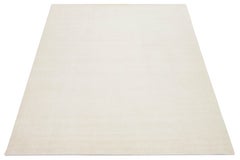 Contemporary Indian Texture Handmade Wool Rug in a Solid Ivory Color