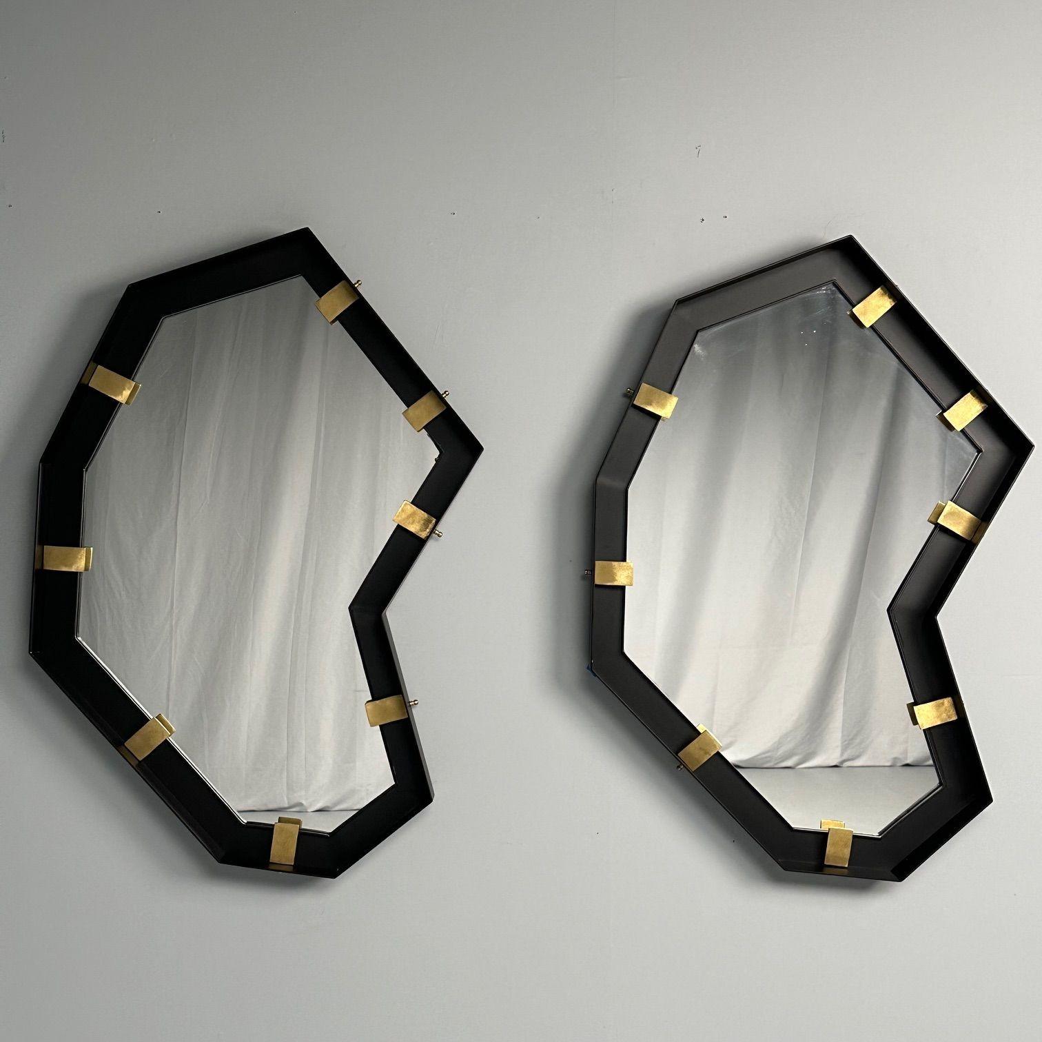 Industrial Modern, Steel, Brass, Brutalist Angular Wall Mirrors, 21st C.
 
Pair of modern mirrors having steel and brass frames; each example having sharp lines and an overall very unique shape. This pair has a very industrial style - likely