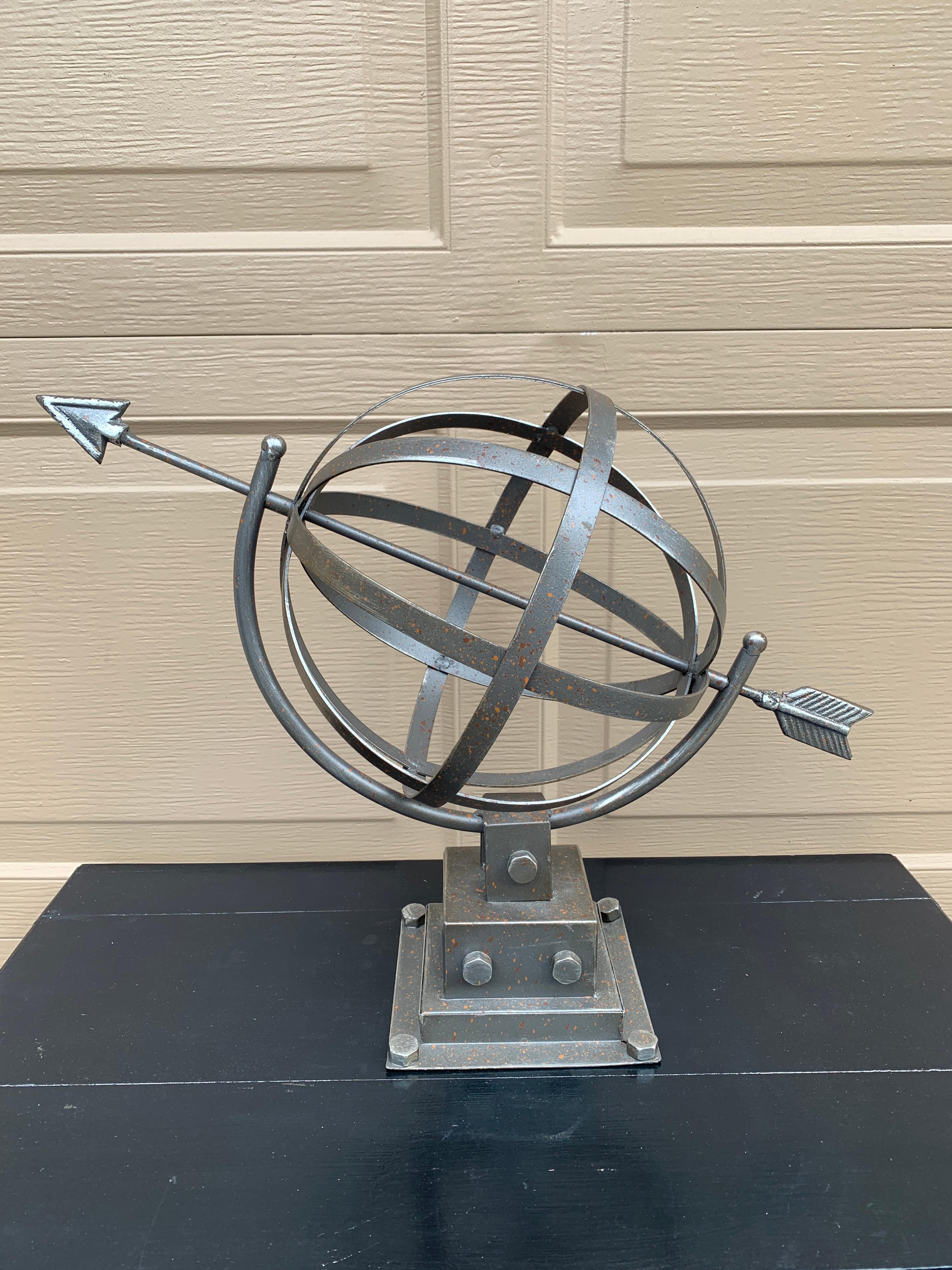A stunning contemporary iron garden armillary sundial

USA, Late 20th Century

Measures: 19