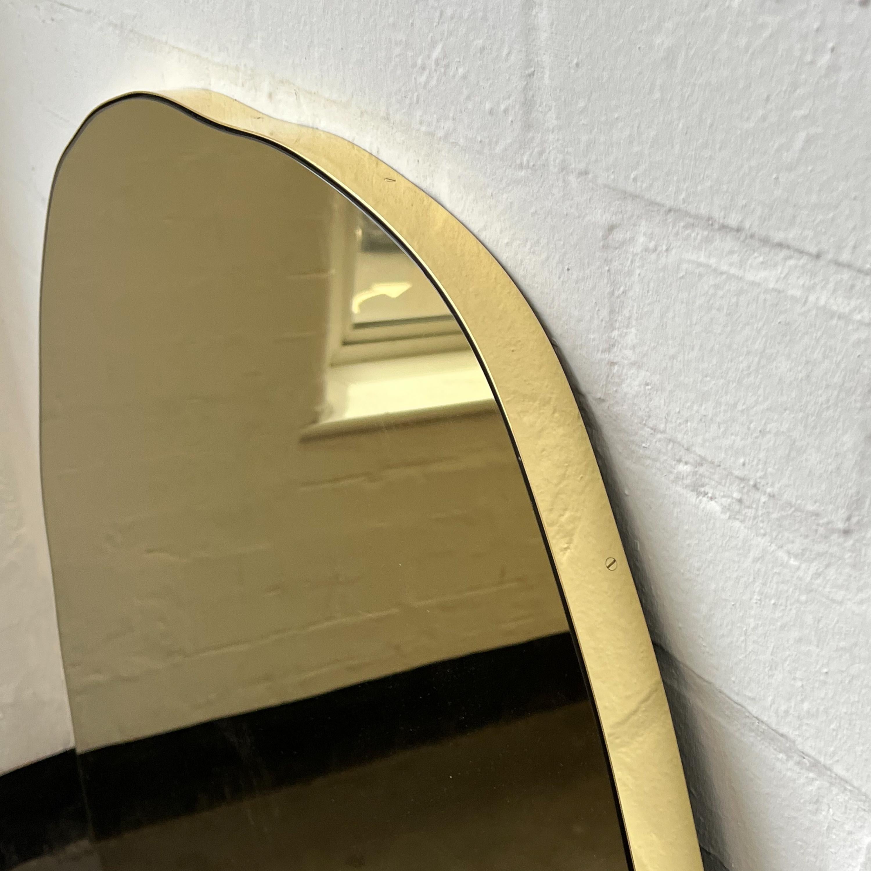 British Contemporary Irregular Freeform Gold Tinted Mirror with Brass Frame, Oversized For Sale