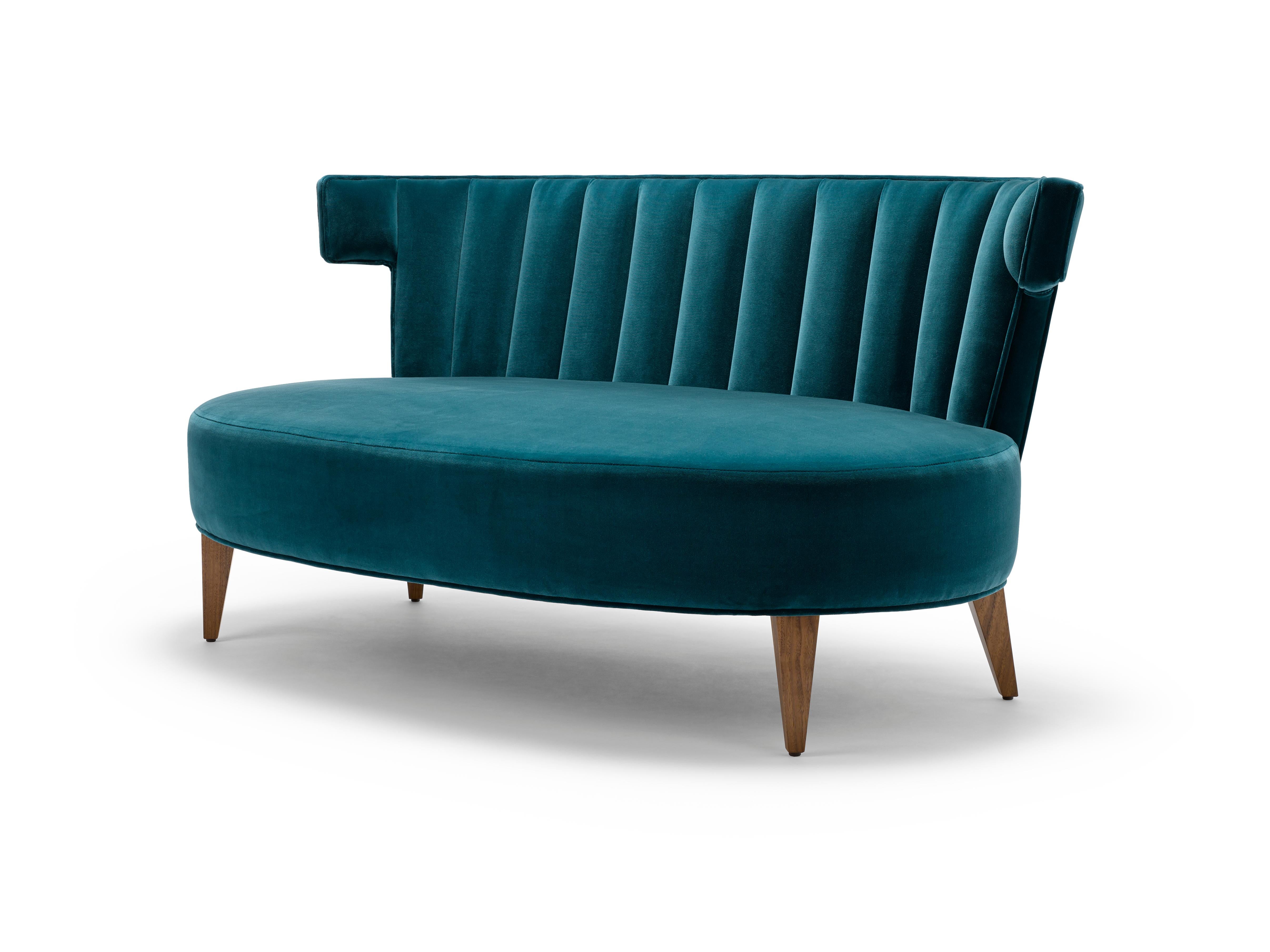 An elegant addition to the Isabella range, this Occasional Sofa is perfect for intimate conversation or soulful contemplation. Shown here upholstered in Designers Guild Cassia Kingfisher, with legs in natural oiled walnut.

Construction: solid