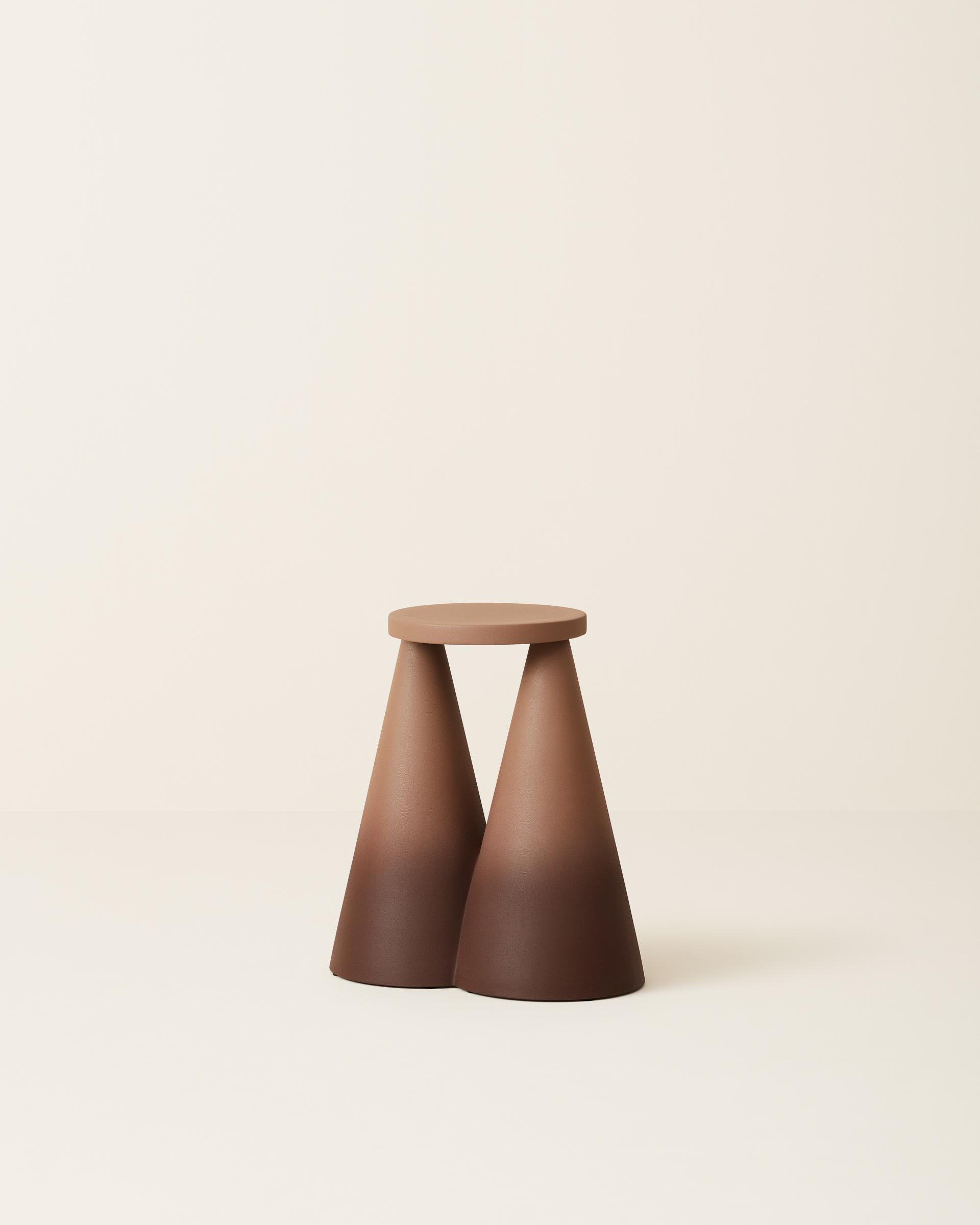 Isola side table is completely made in ceramic using high temperature furnace, to make the material stronger.

The large base makes the object stable as well as unique on its design.

Each piece is then finished by playing with the contrast