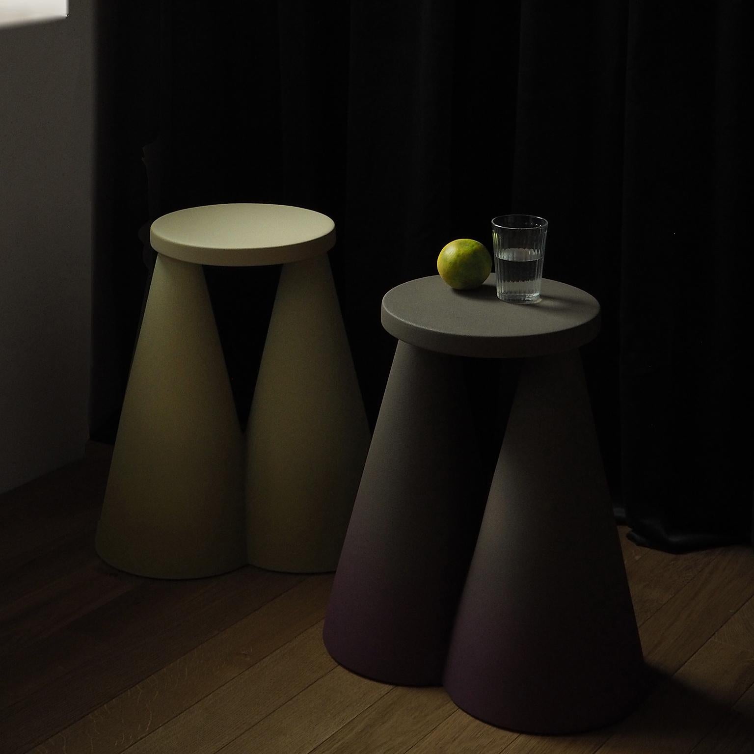 Isola side table is completely made in ceramic using high temperature furnace, to make the material stronger.

The large base makes the object stable as well as unique on its design.

Each piece is then finished by playing with the contrast