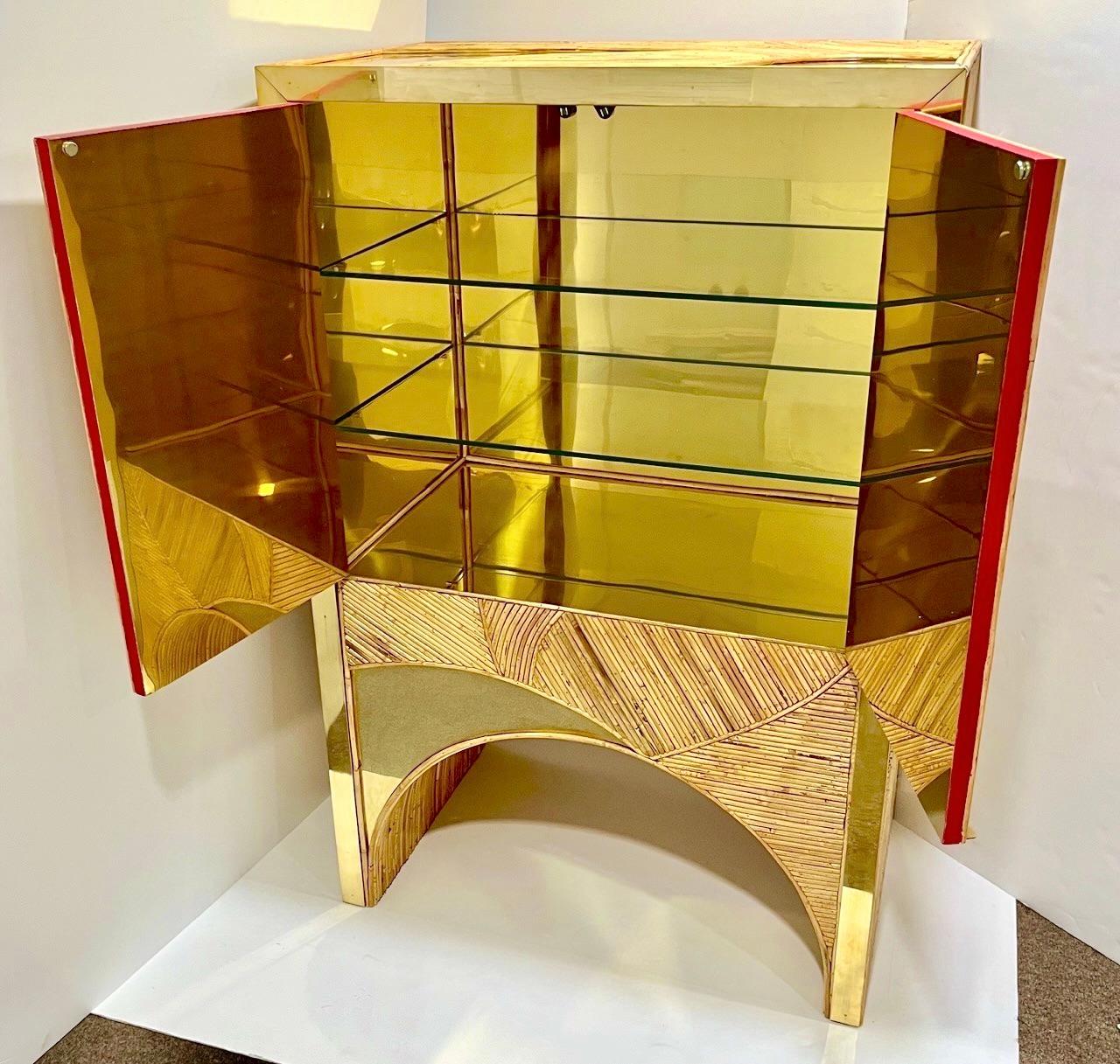 Our Italian bar / cabinet with swirling rattan and brass veneer with a finished back even more beautiful than any other side! This piece can stand away from the wall or be used as a partition.
This bar cabinet is a statement of unique creative