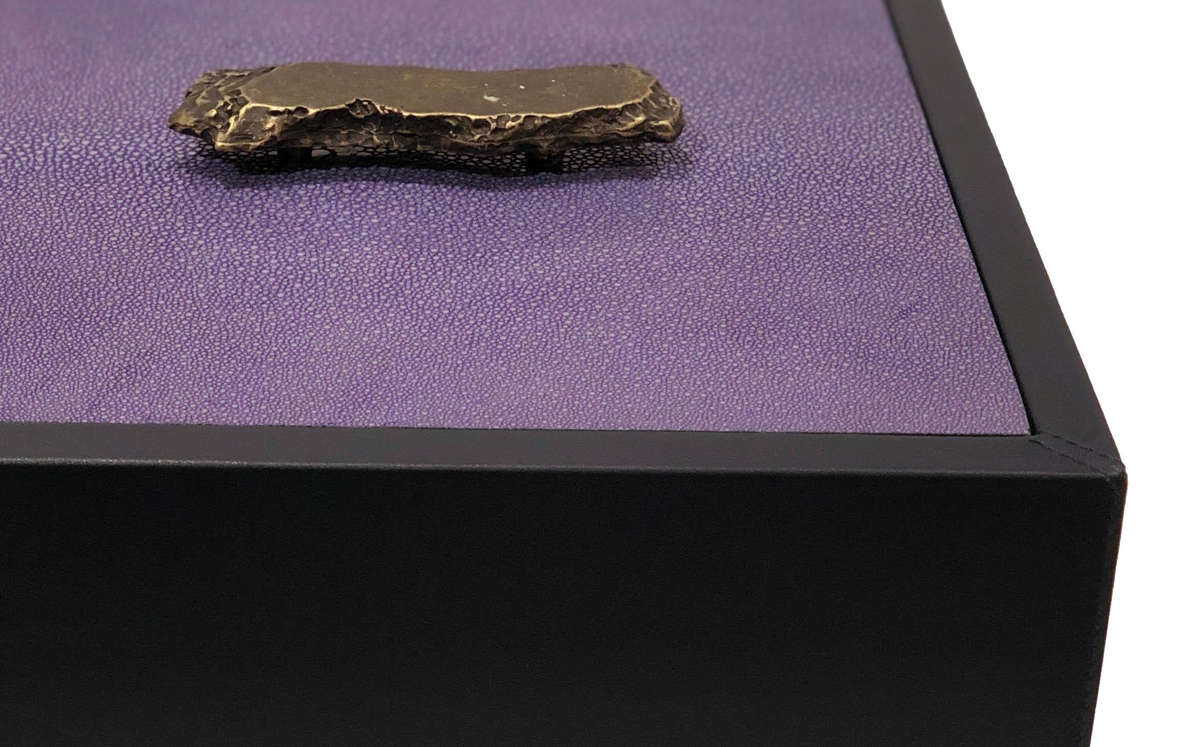 Contemporary square black leather box with inset purple shagreen lid and abstract bronze handle (Made in Italy).