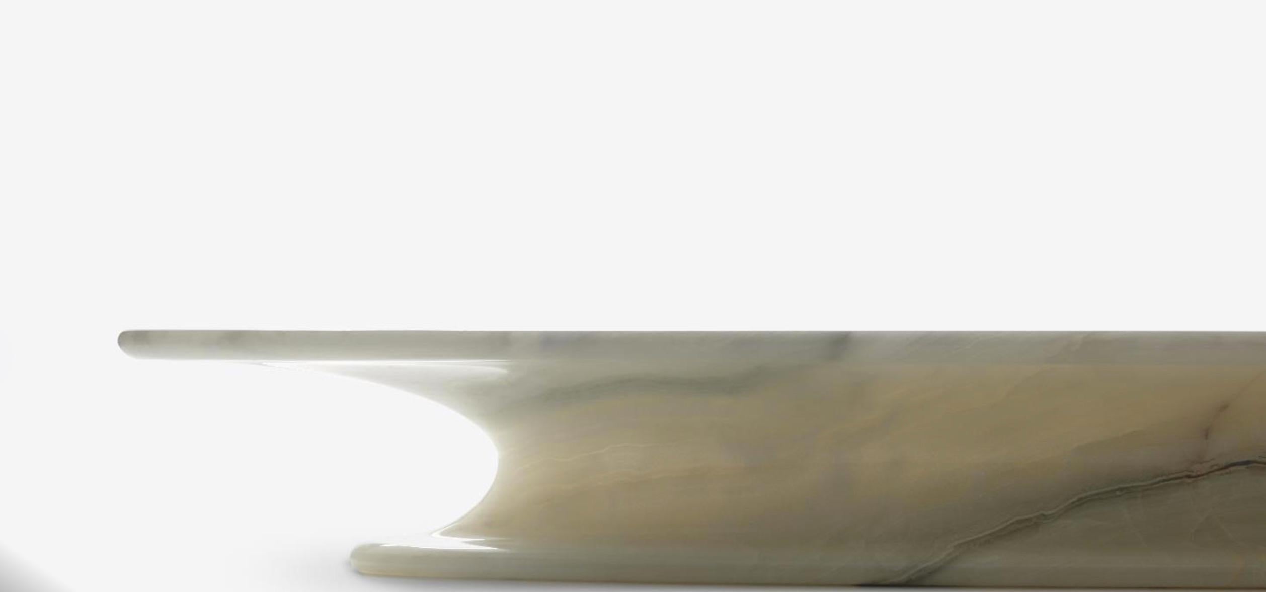 This exceptional work of functional art is designed by Anish Kapoor and produced by our partners in Italy. This limited edition of 5 is created in a highly polished Bianco (white) Onyx, the natural patina and materiality of the stones create a