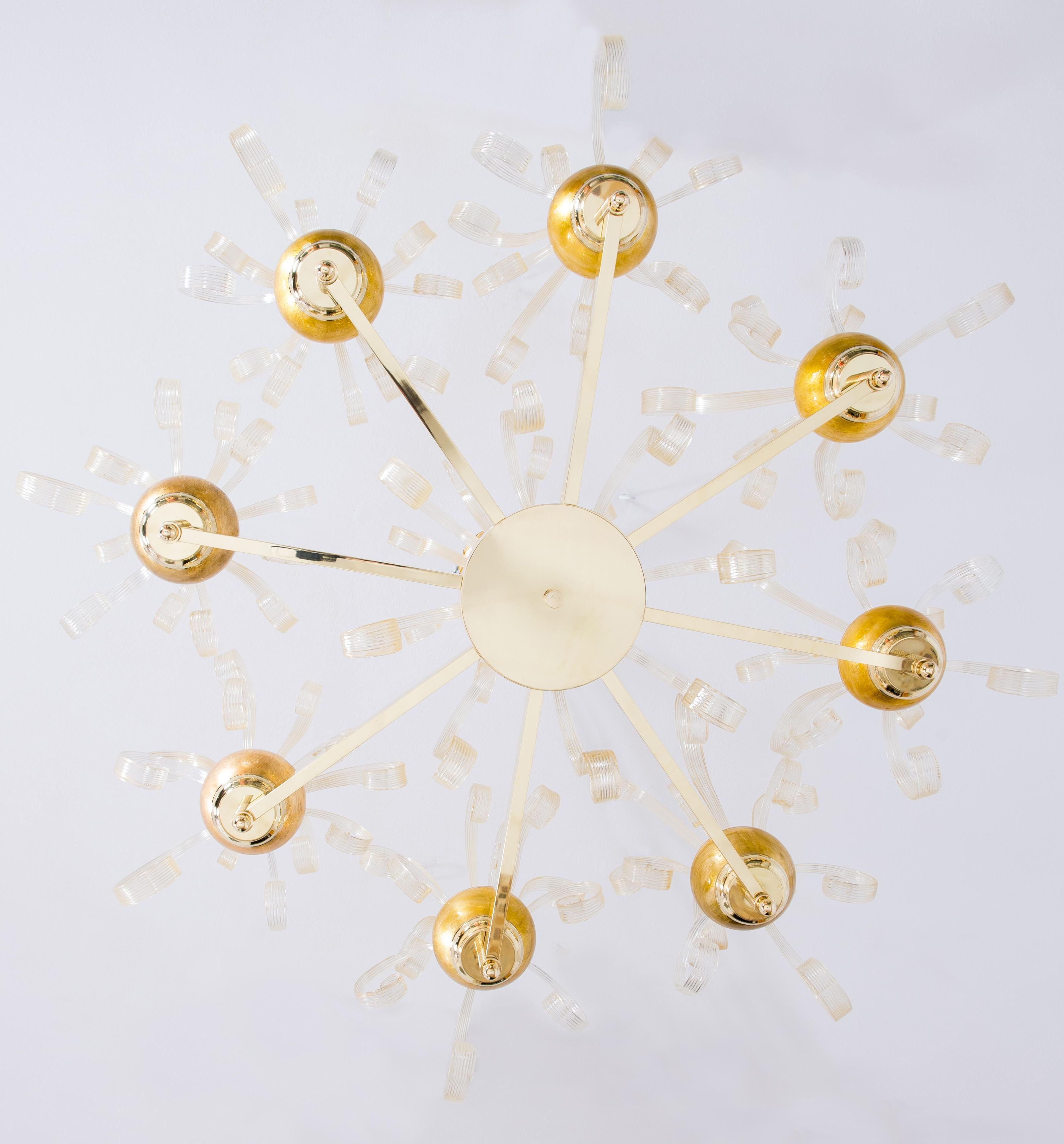 A Rare and Exquisite Gold Murano Glass Chandelier with Gold Pastorals by Giovanni Dalla Fina, Contemporary Italy.
This exceptional work of art, entirely handcrafted in Murano glass by the renowned Italian artist Giovanni Dalla Fina, embodies the