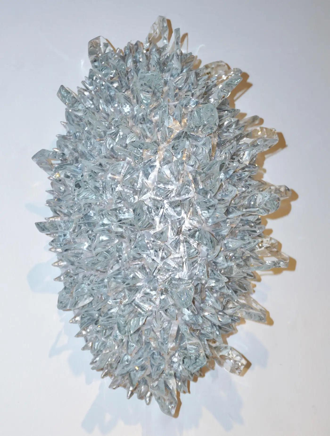 Italian oval wall light or flush mounts, true work of art sculpture, entirely handcrafted like a jewel, the sophisticated organic decoration is composed of hand cut and hand polished rock glass slivers of different sizes set in relief in a hand-cast