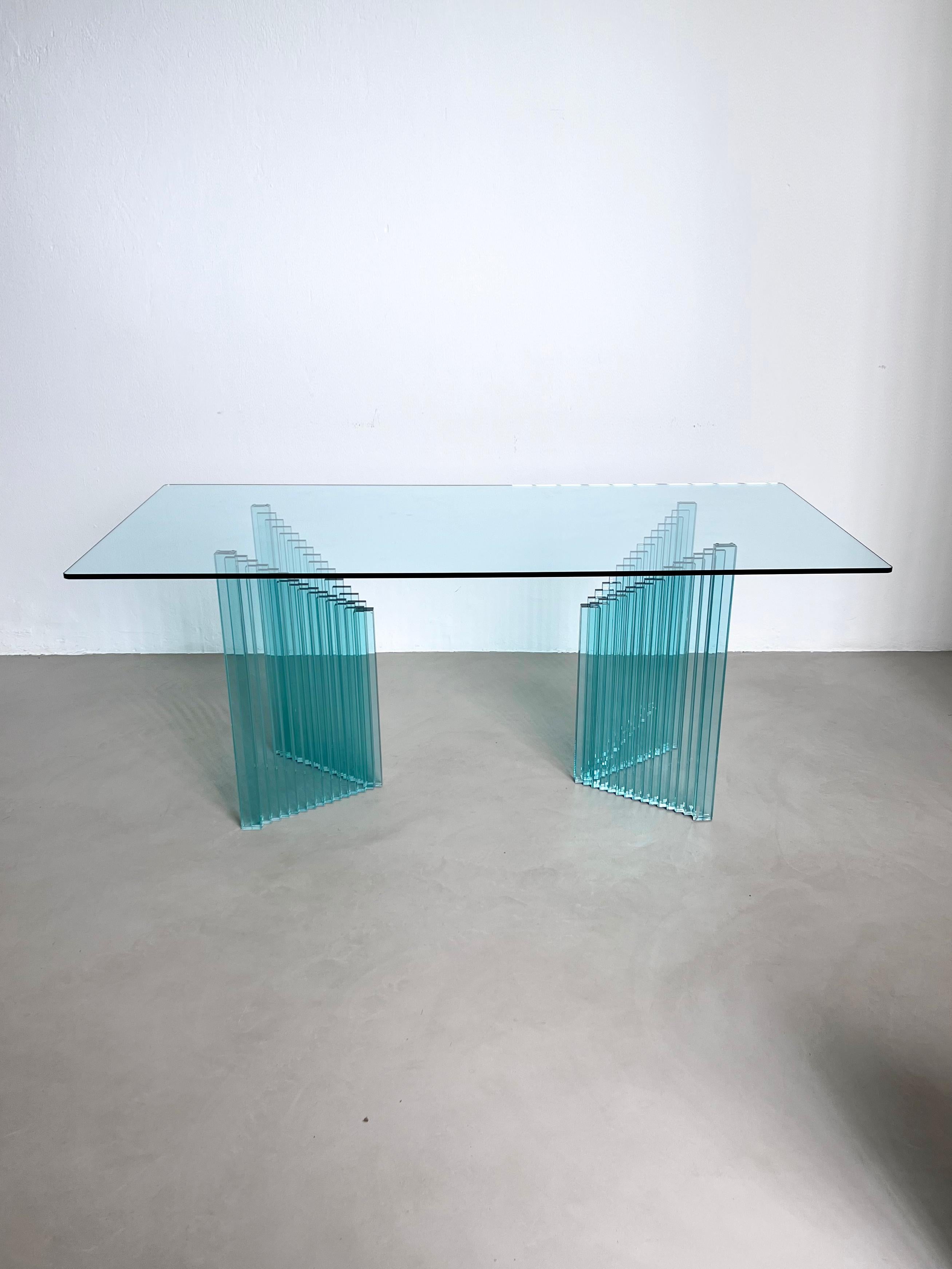 Contemporary design 1980s glass dining table by Luigi Massoni for Gallotti & Radice.

The collaboration between Gallotti & Radice and architect Luigi Massoni began in 1969, when he reached out to the furniture brand asking for a custom table to use