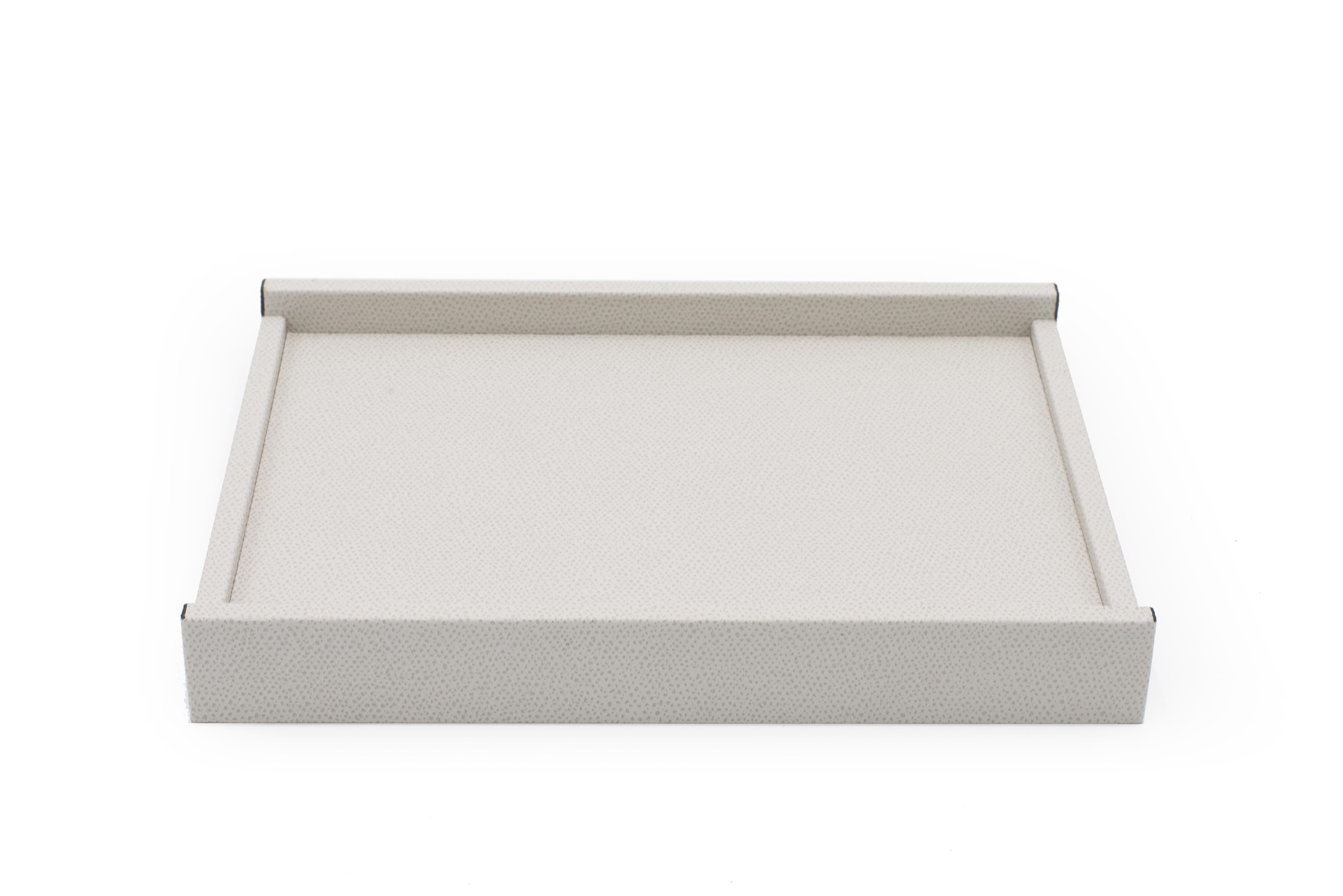 Contemporary rectangular light gray valet tray with two low sides and two taller sides (Made in Italy).