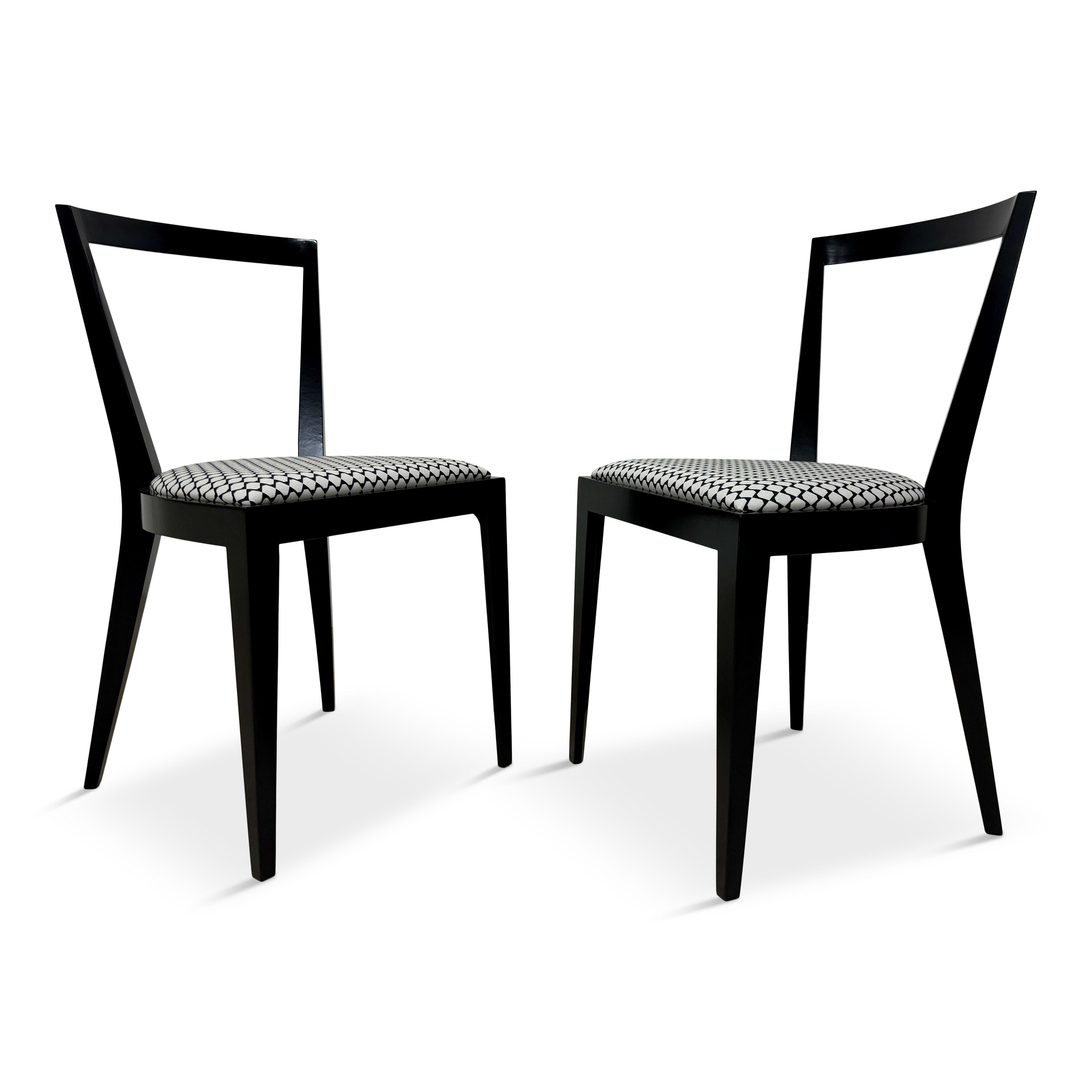Dining chairs

Elegant frame

Fabric seat

Made in Italy

Contemporary

Also available in a natural finish

These contemporary Italian dining chairs are a perfect blend of modern design and classic sophistication. Inspired by mid century design