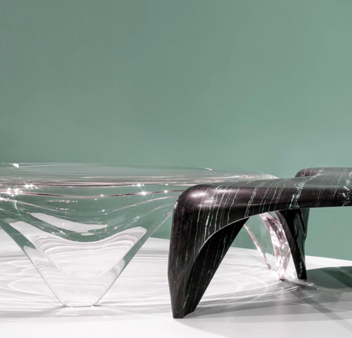 Introduced at the Salone del Mobile 2019, this limited edition table designed by Zaha Hadid in tropical storm honed marble and polished Plexiglass is sure to be a conversation piece in any interior.

Referencing coastal rock formations carved by the