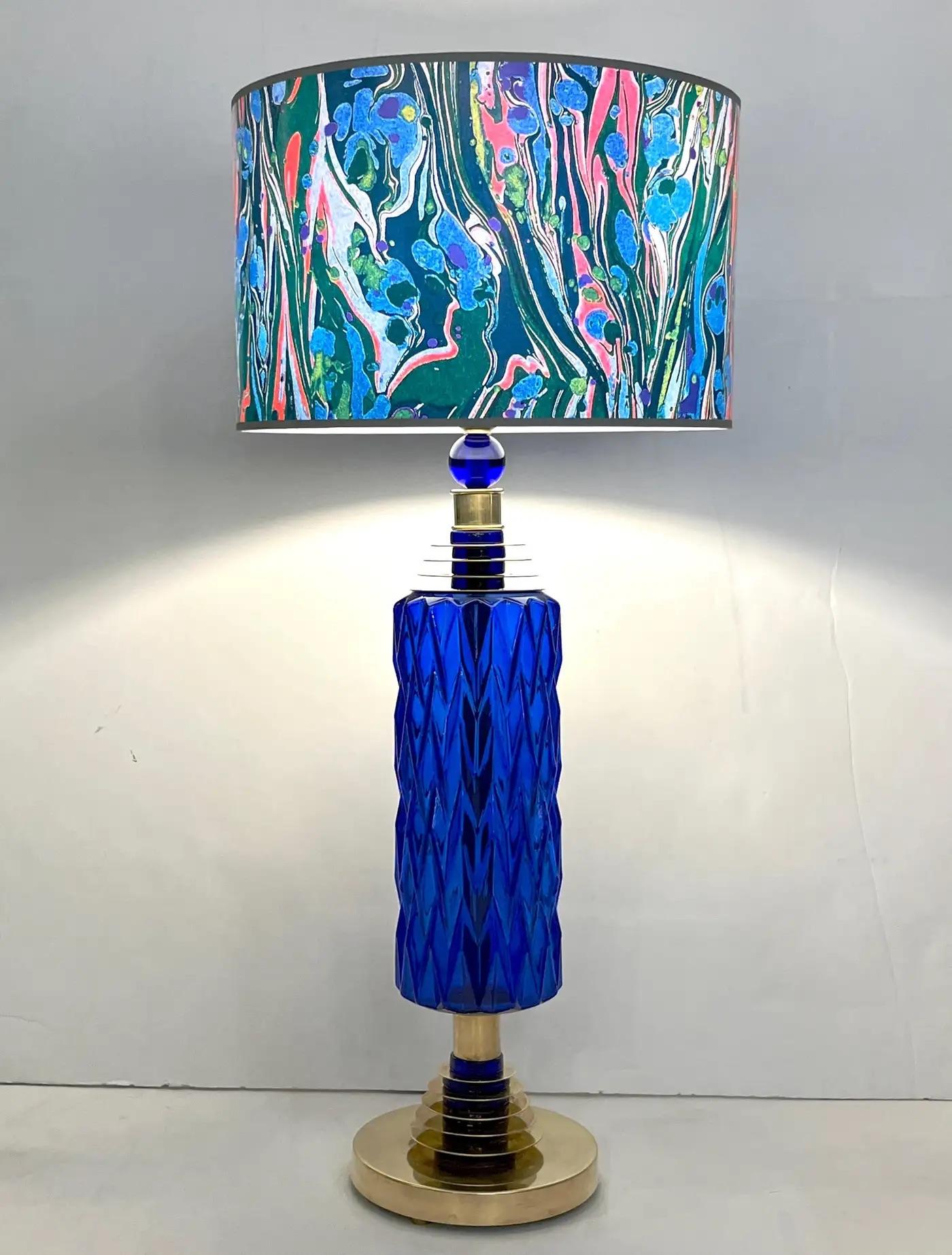A tall modern pair of blown beehive Murano glass lamps, high quality of craftsmanship, organic design with blown royal blue bodies, preciously decorated with a diamond cut pattern and supported by hand made brass stepped accents interspersed with