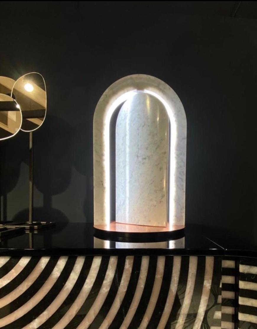 This collection of Italian table lights designed by Italian designer Fabrizio Bendazzoli together with our Italian partner and is available in three different marbles : Bianco Carrara, Nero Marquina and Botticino marble. Pictured here in Botticino