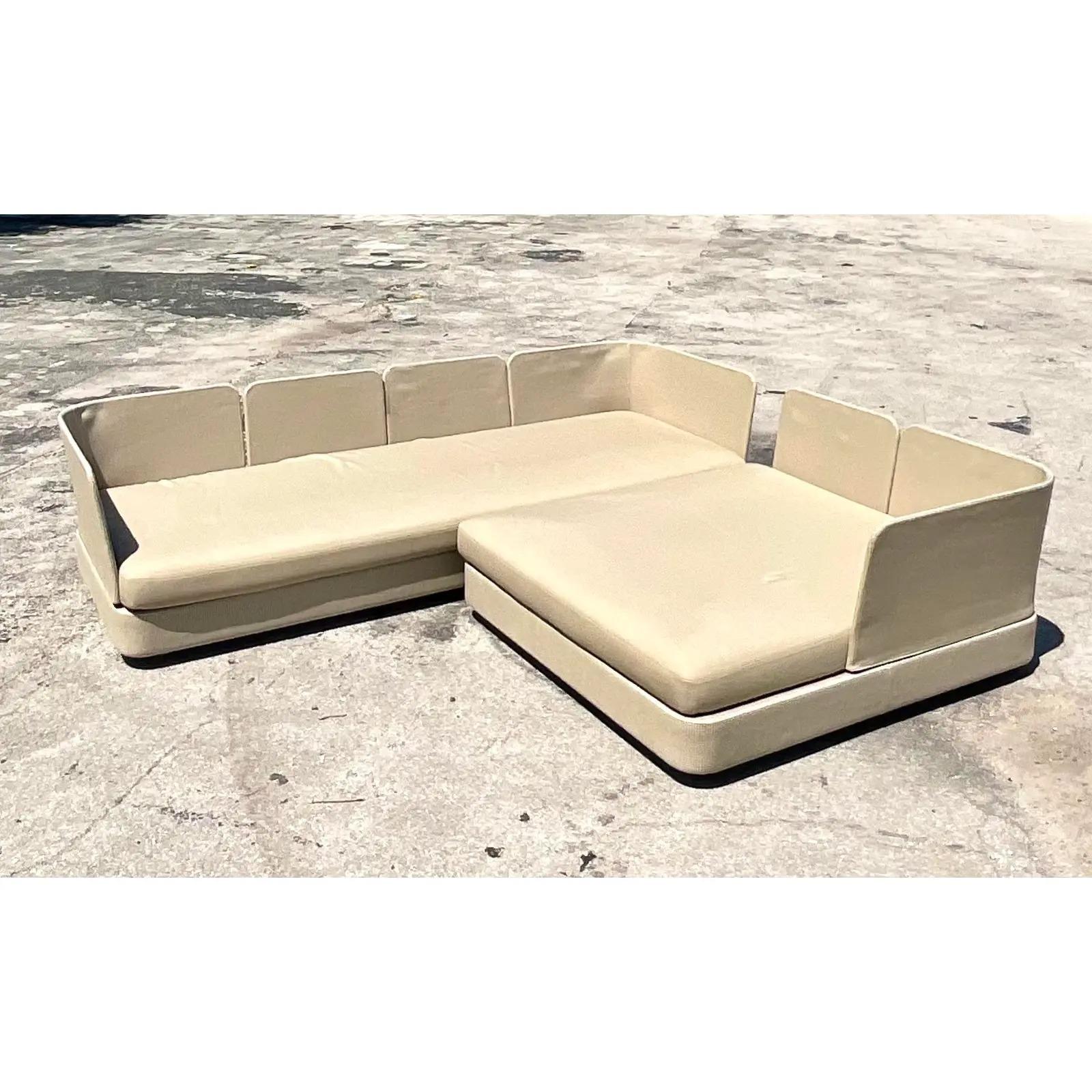 Fantastic Contemporary outdoor Cove sectional sofa. Made by the talented Paola Lenti. Beautiful monumental shape with interchangeable panels. Move them around to create the mood you are looking for. Separate the pieces to create two separate areas.