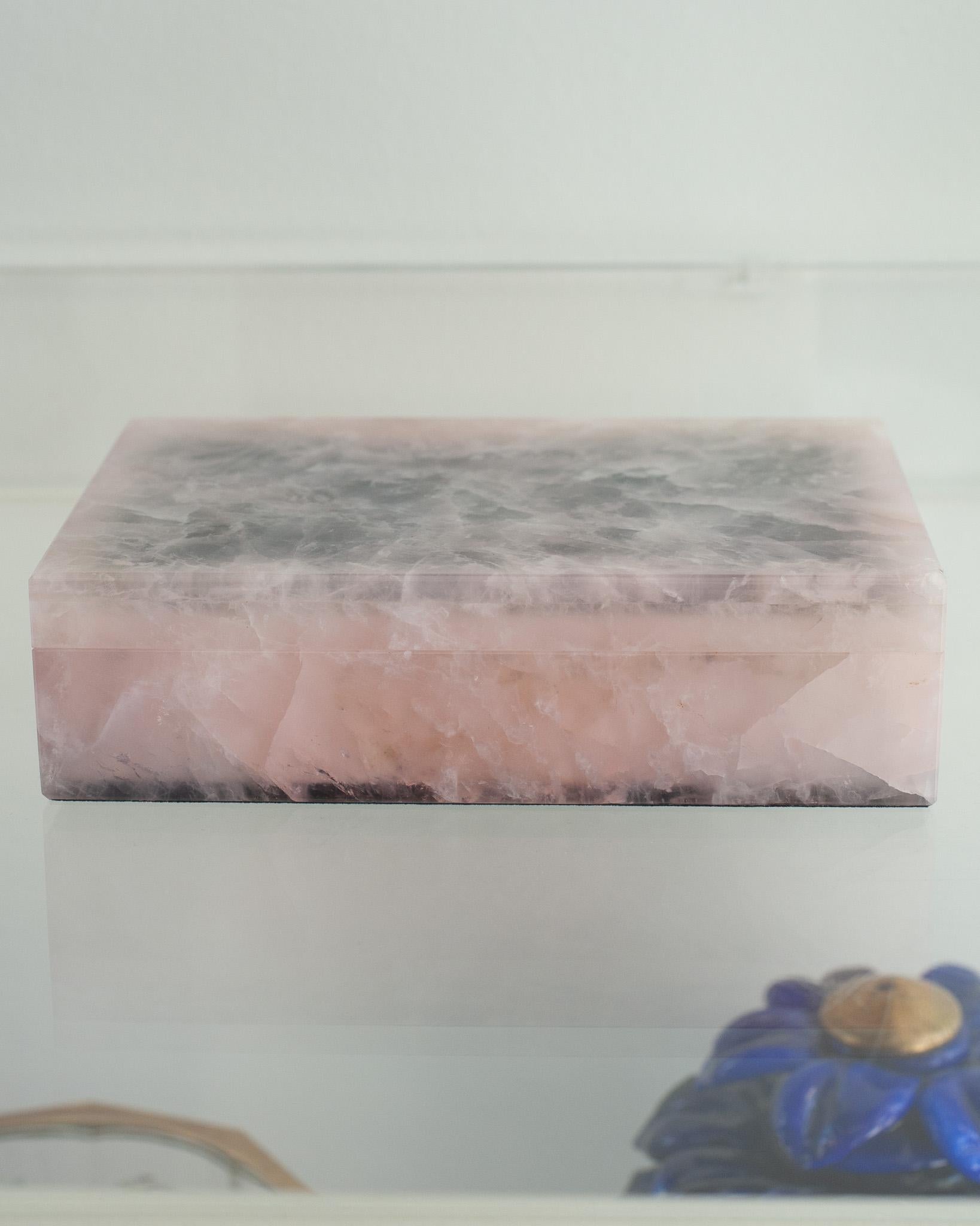 Invite healing energy into your home with this exquisite Rose Quartz box. Known for its gentle and soothing properties, rose quartz is a stone of love and compassion, bringing a sense of peace and balance into your space. The box features a