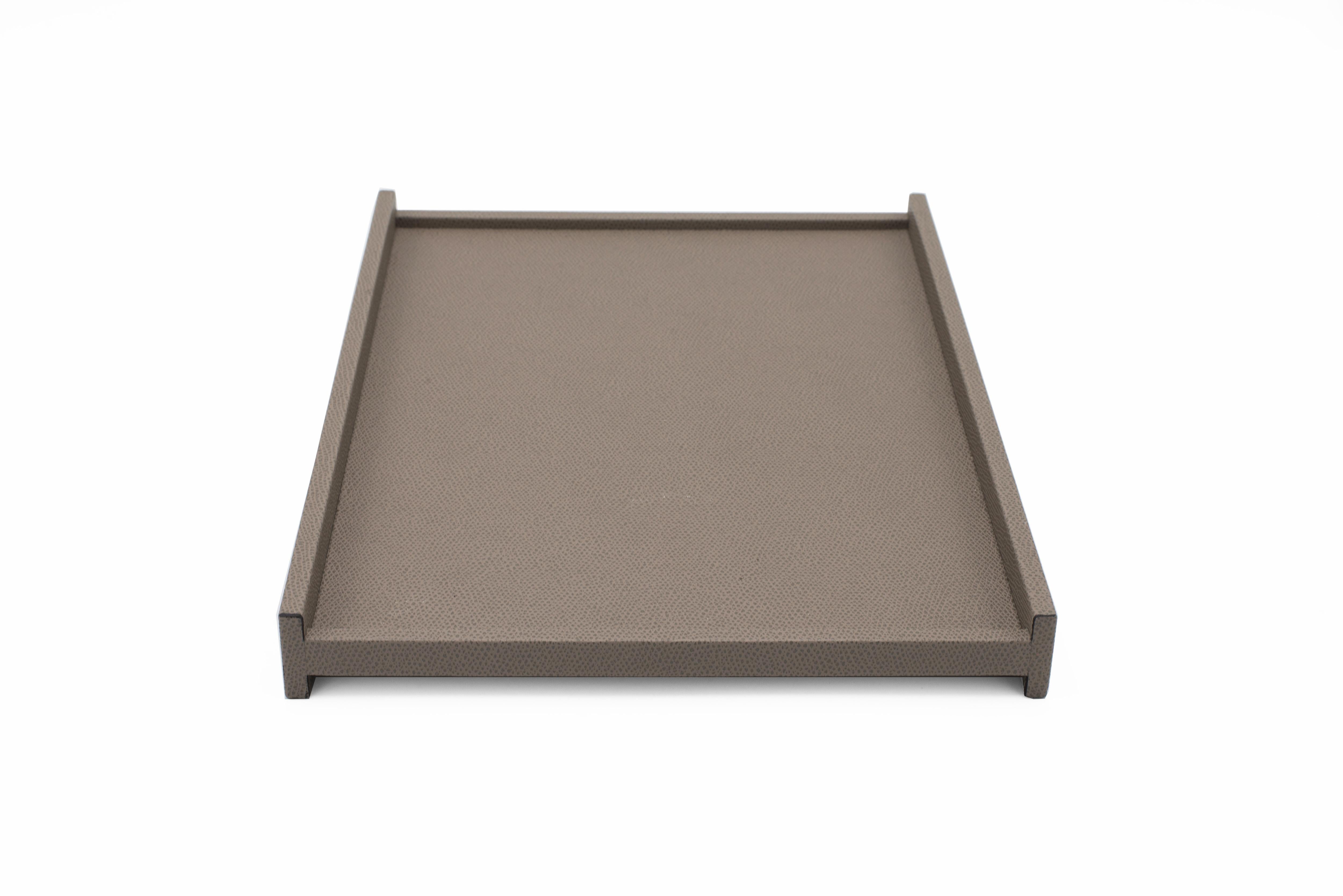 Contemporary rectangular taupe calfskin valet tray with two low sides and two taller sides (Made in Italy).