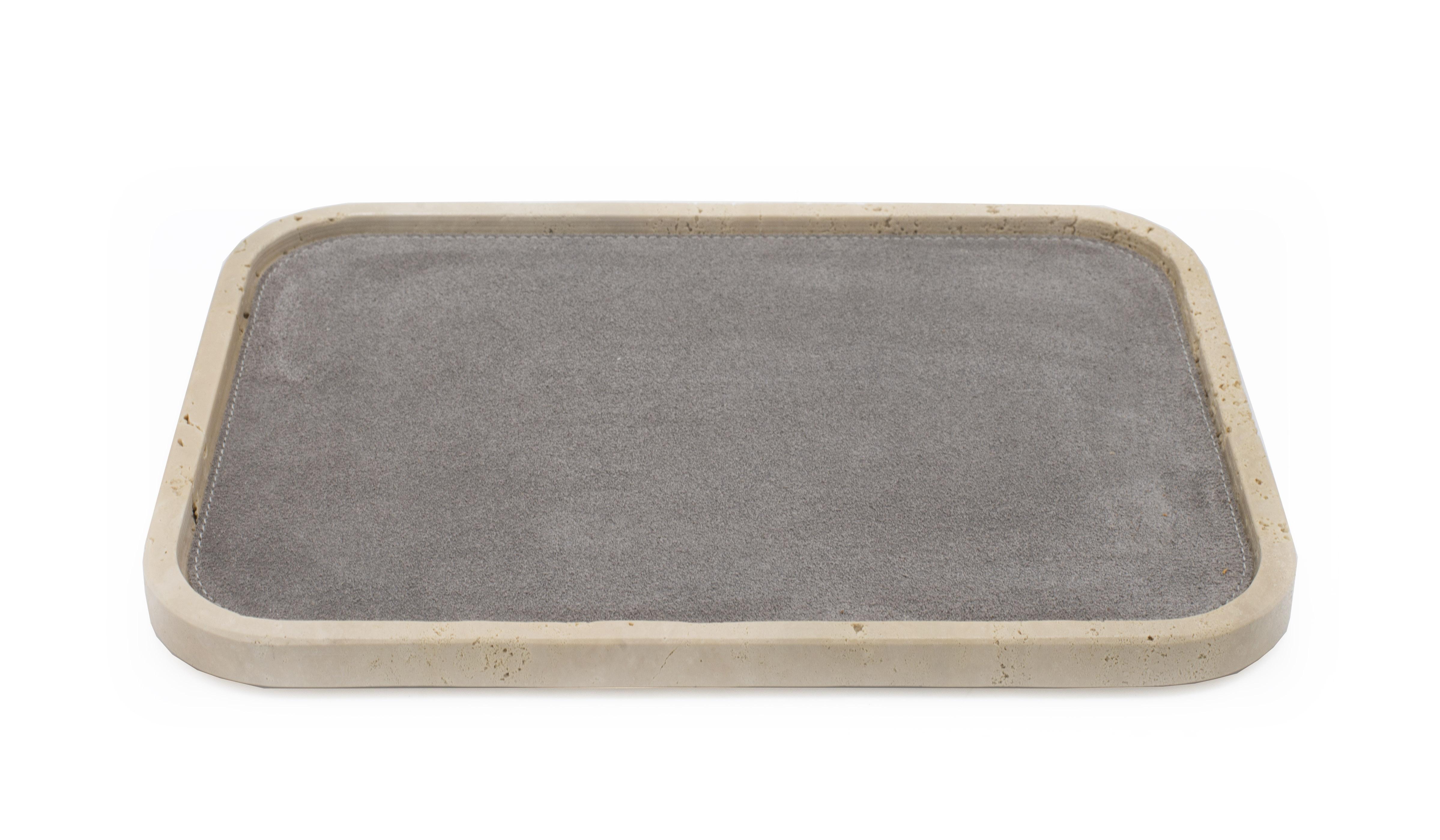 Contemporary rectangular travertine valet tray with a gray suede interior and rounded corners (Made in Italy).