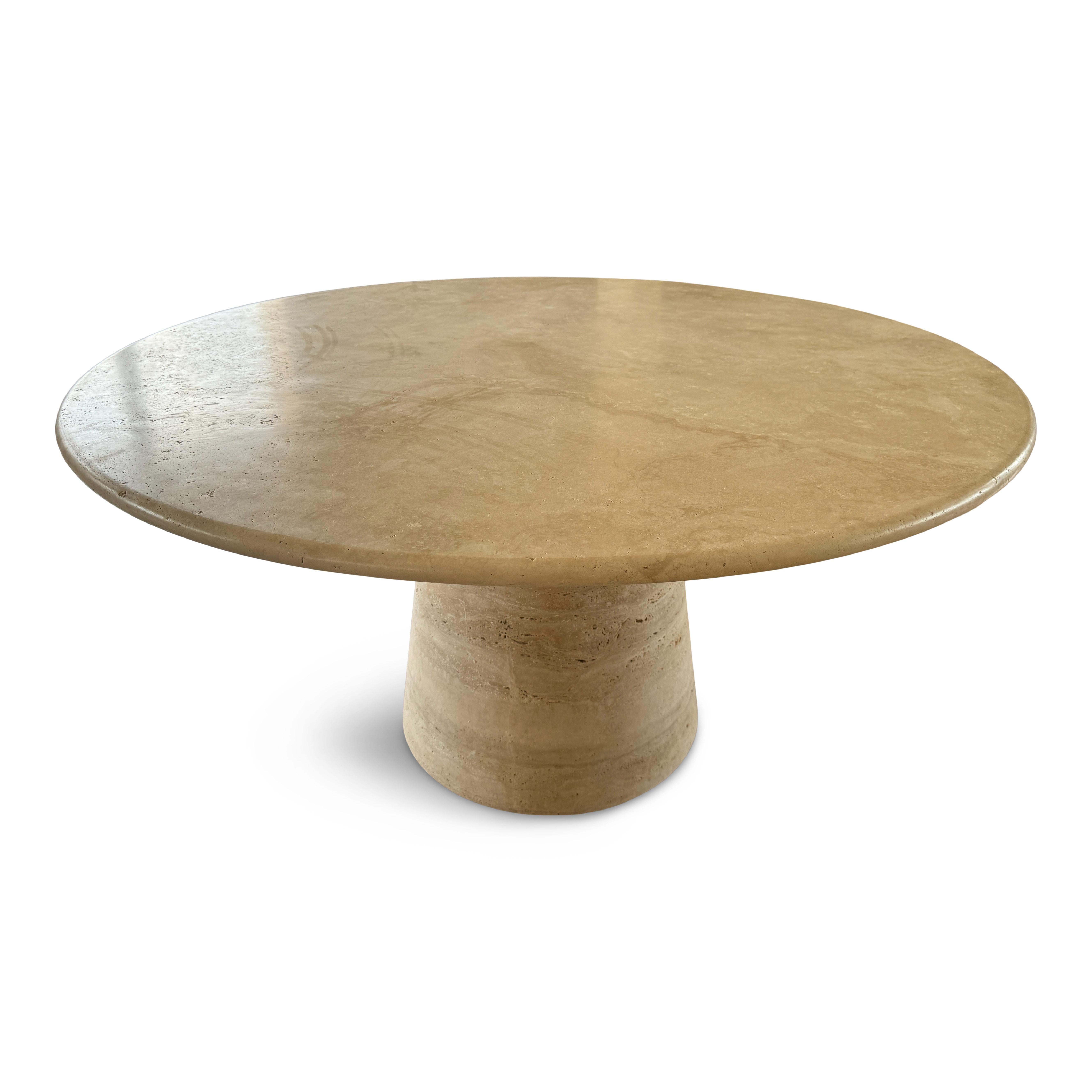 Travertine table

Large conical pedestal 

60cm diameter pedestal

Made in Italy

Contemporary

Dimensions can be customised

This stunning large round dining table, crafted from luxurious travertine, epitomizes Italian mid-century design. The table