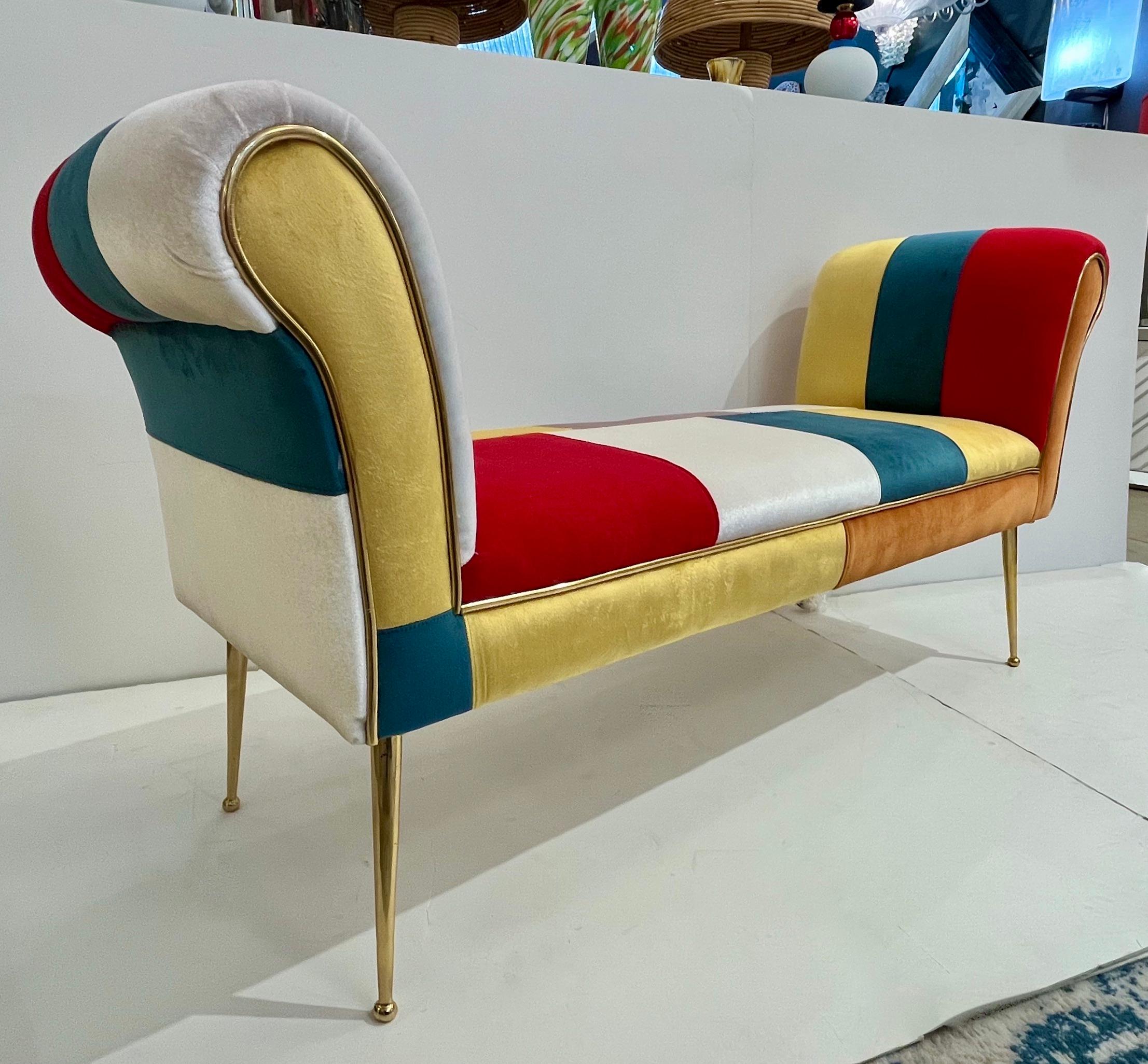 A very fun and colorful addition to any interior, meant to uplift spirits! An Italian multifaceted style modern settee with a thrilling velvet upholstery for the unusual and unique Mondrian inspired decor, in white, yellow, green, red, terracotta