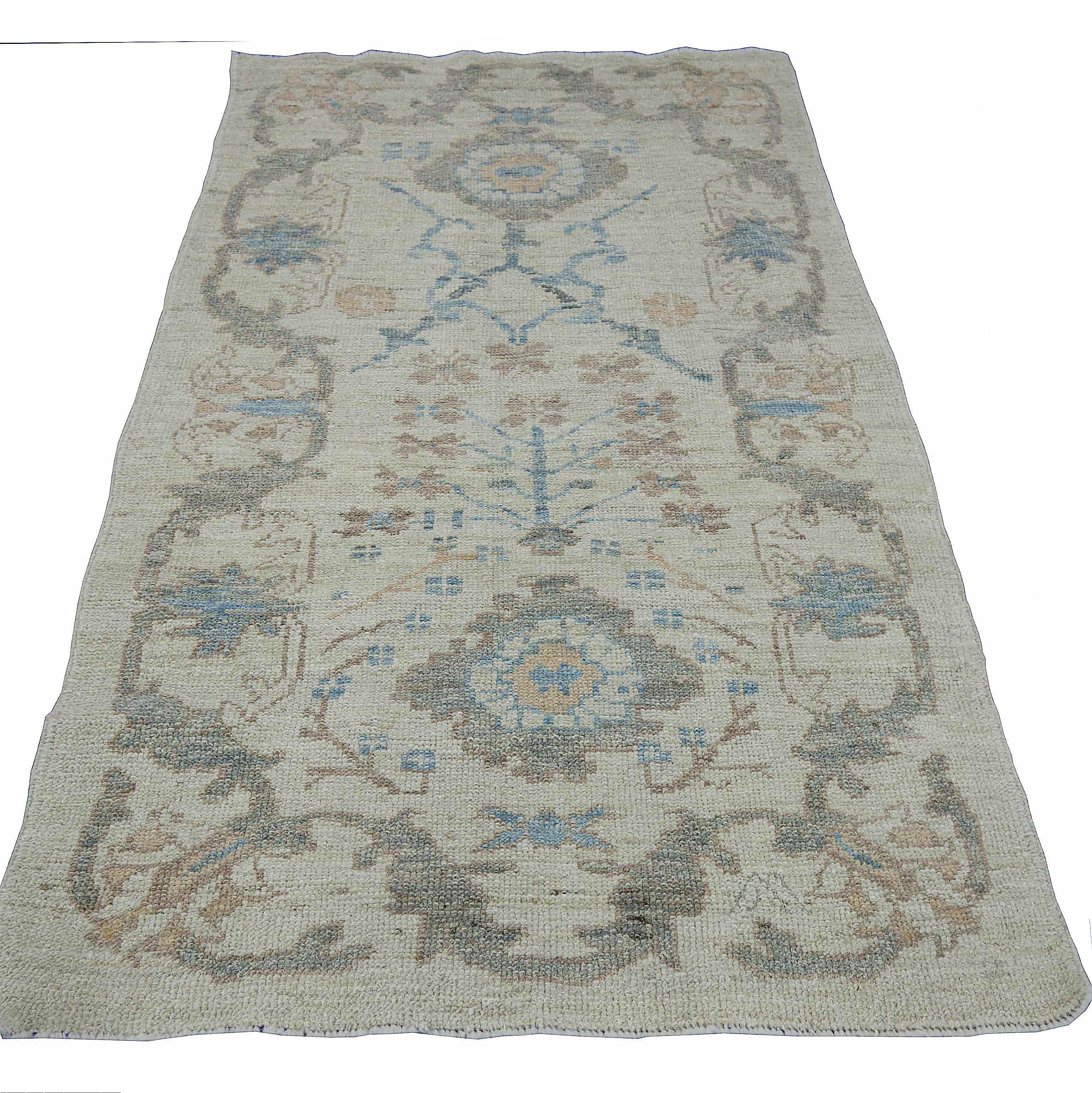 Hand-Woven Contemporary Ivory Oushak Rug with Floral Motifs in Gray, Brown, and Blue For Sale