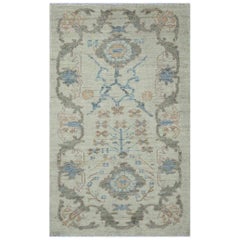 Contemporary Ivory Oushak Rug with Floral Motifs in Gray, Brown, and Blue
