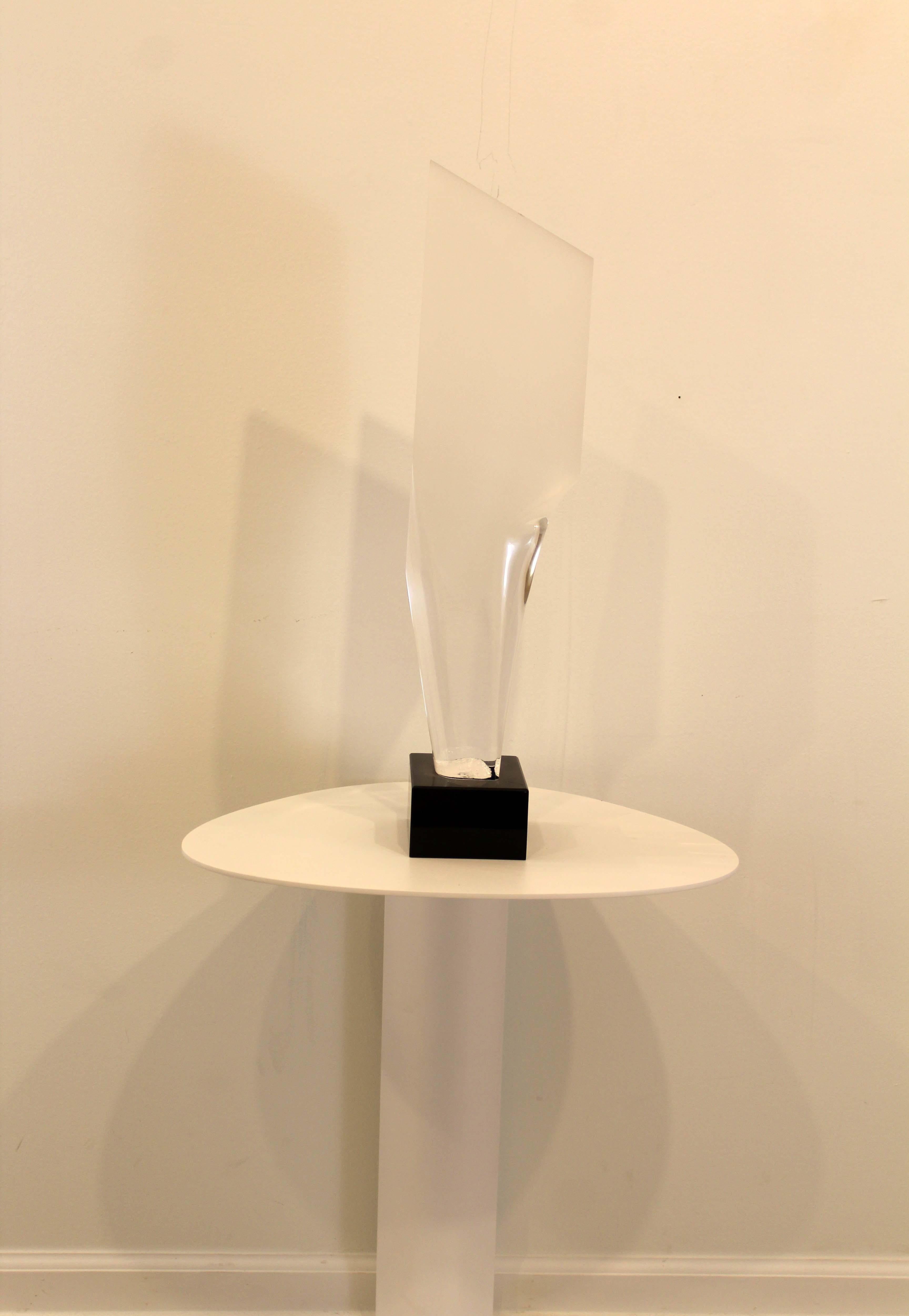 A stunning modern statement piece, a large lucite sculpture titled Chisel 33 by Detroit sculptor James Nani. Dated 1993. Dimensions: 23.25 H x 5 D x 6 W. In excellent vintage condition.

James Nani (1926-2016) was a Detroit artist for over 50