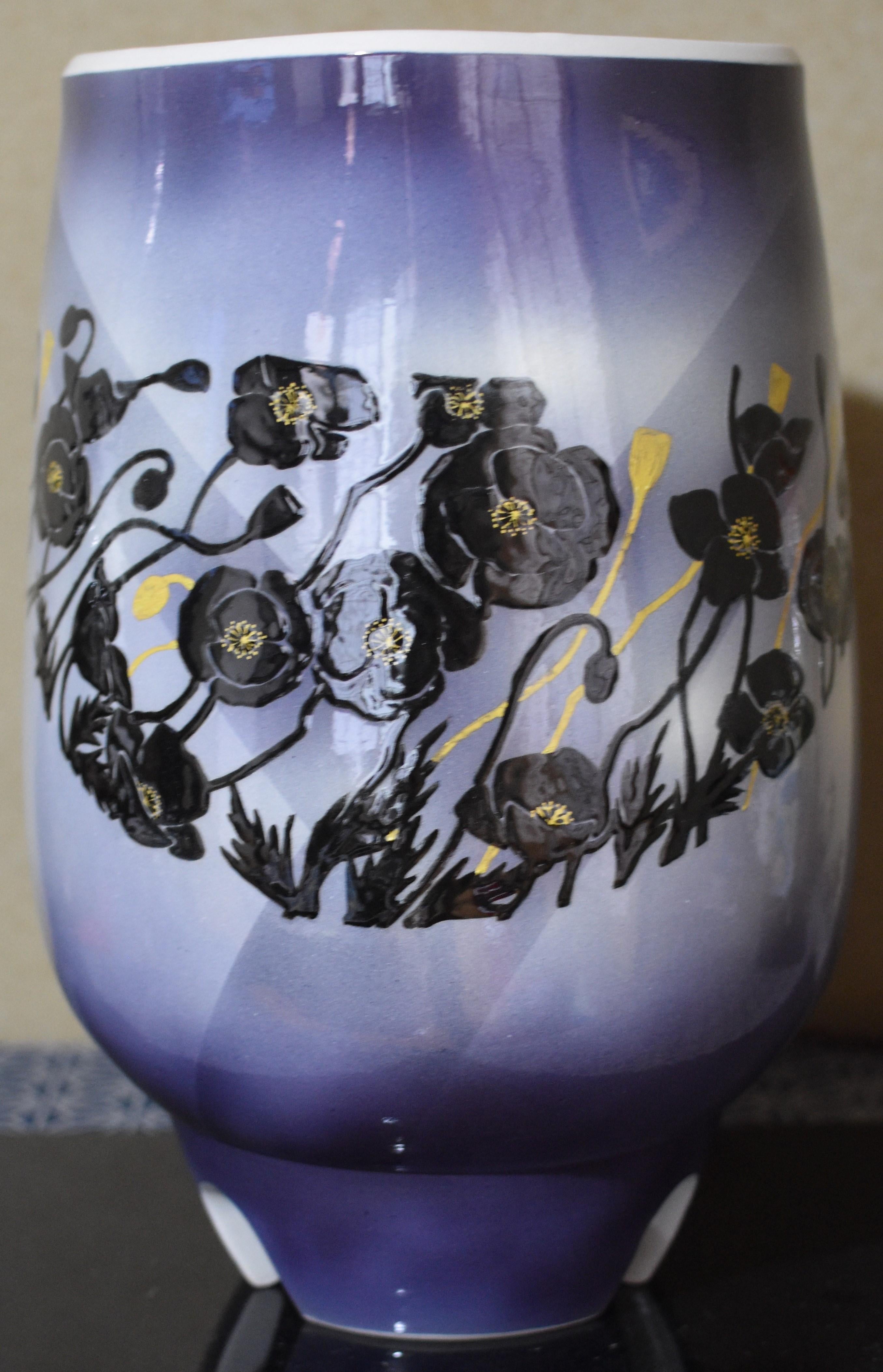 Exceptional contemporary Japanese decorative legged porcelain vase of extraordinary quality, intricately hand painted in black, set against beautiful shades of the artist's signature purple blue on a stunningly shaped porcelain body. It is a signed
