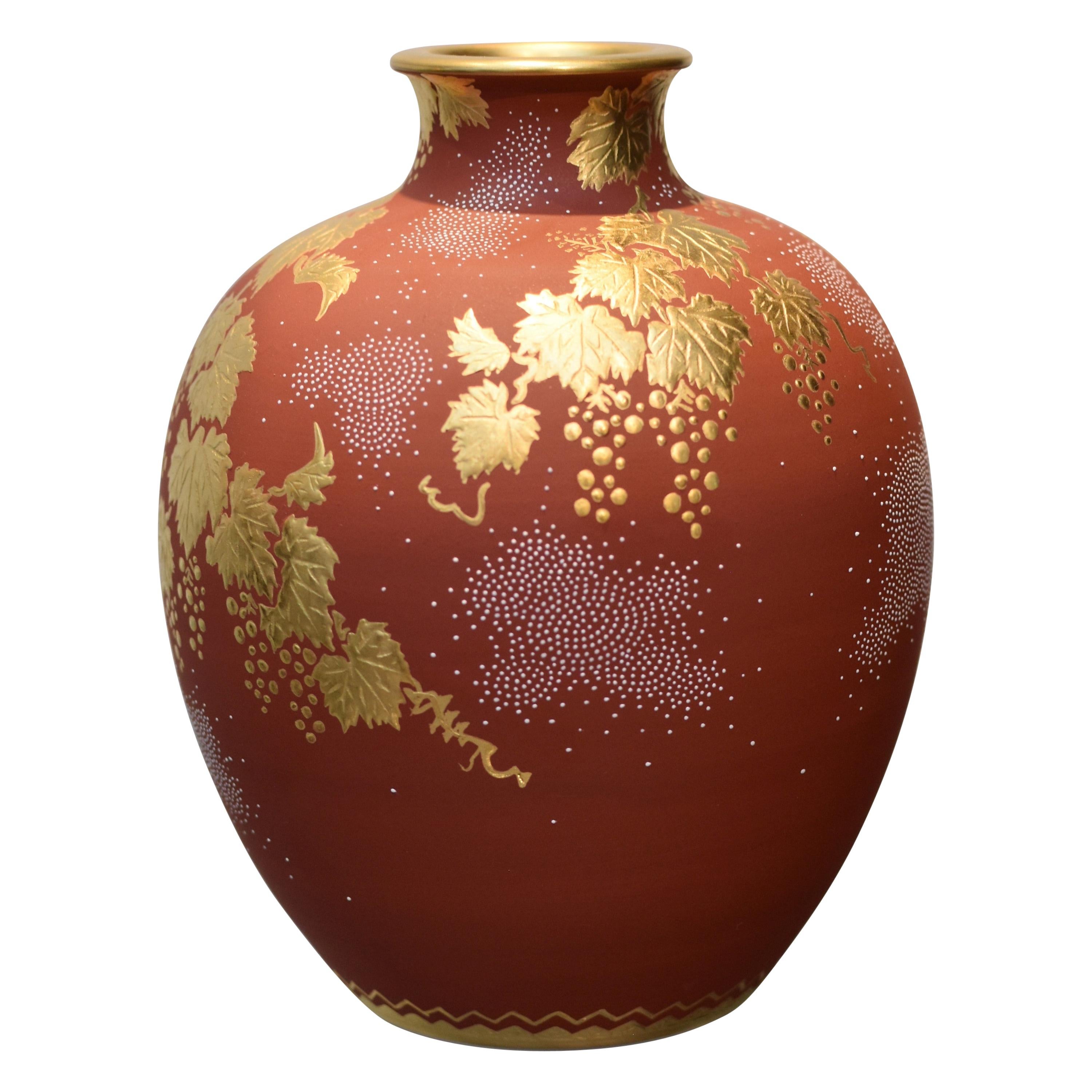 Kutani vase with vibrant flower motif and signed
