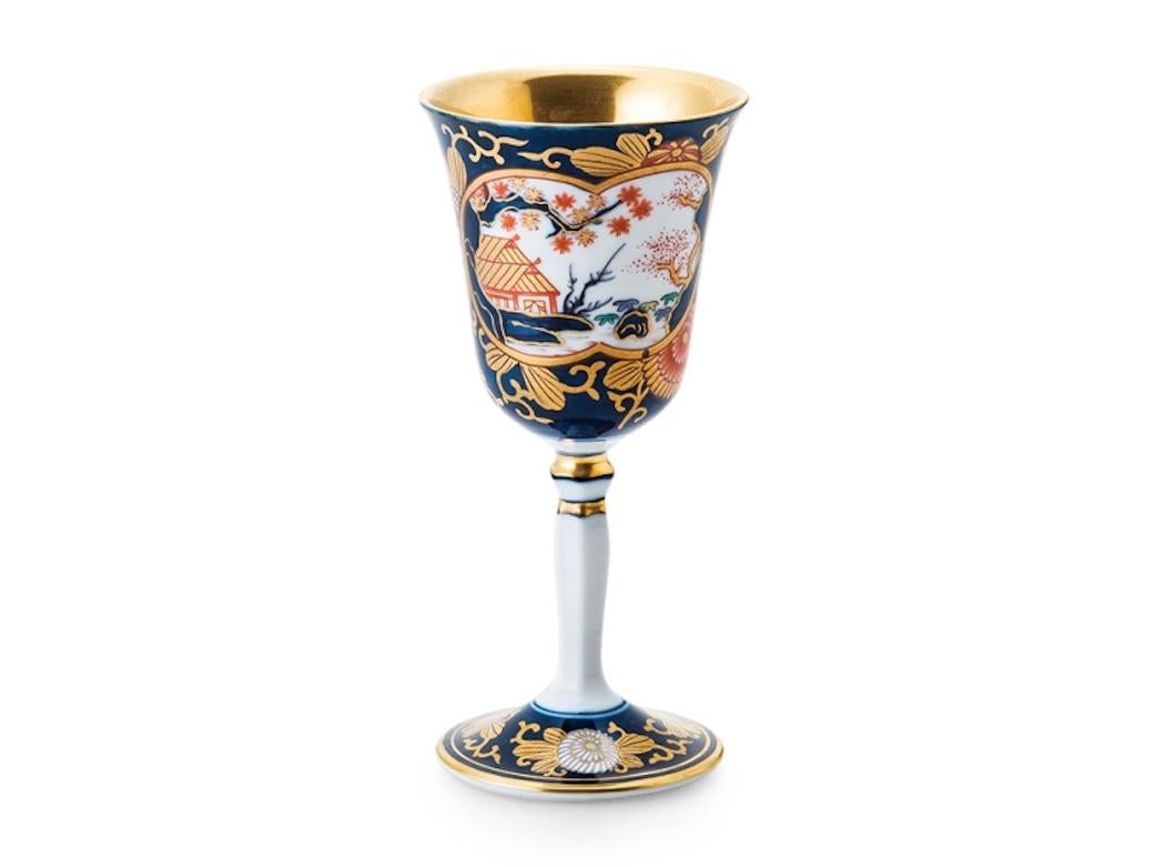 Exquisite contemporary Japanese Ko-Imari (old Imari) porcelain long stem cup, in bright red, blue and green colors and generous gold application that are characteristics of Ko-Imari Porcelain called kinrande. This long stem porcelain cup got