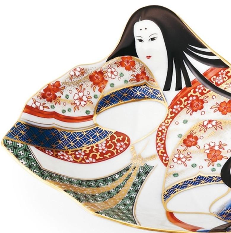 Unique contemporary Imari gilded porcelain dish in the shape of a Heian court lady, showcasing her elegant, multilayered Japanese kimono in intricate painting in red, blue and green with gold details, and her flowing black hair. The Heian period is