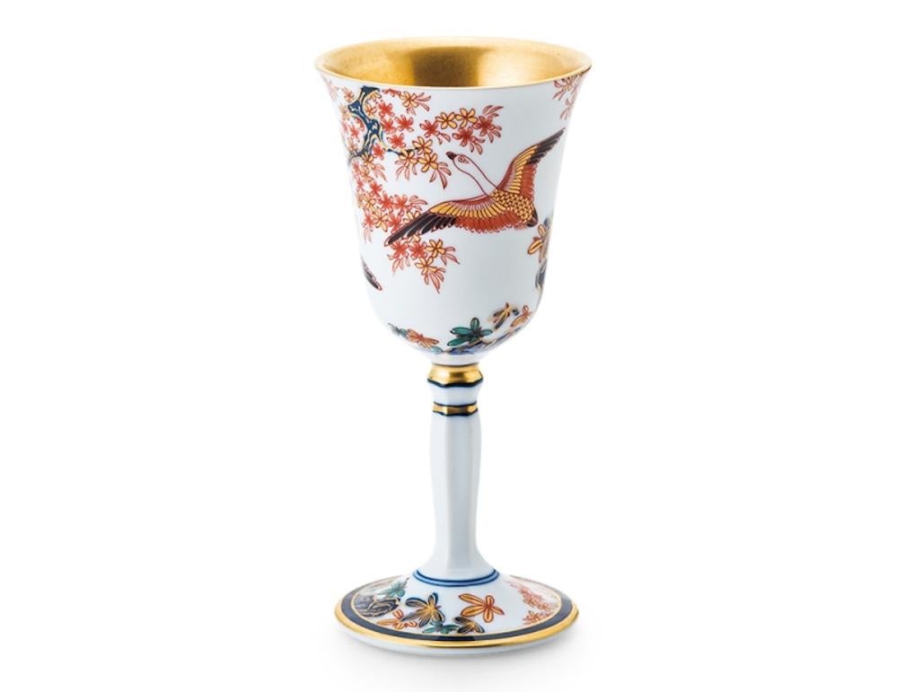 Exquisite Japanese Ko-Imari (old Imari) porcelain long stem cup, in bright red, blue and green colors and generous gold application that are characteristics of Ko-Imari Porcelain called kinrande. This long stem porcelain cup got selected for
