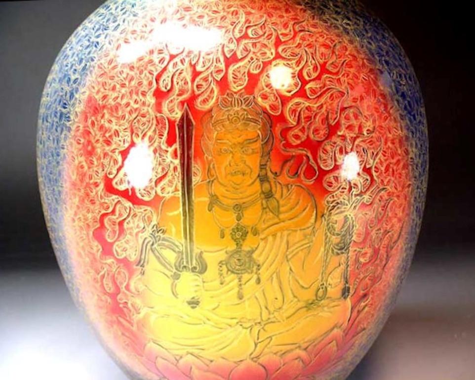 Mesmerizing large contemporary Japanese hand painted decorative porcelain vase, an exclusive signature masterpiece in gold, blue, green and red by highly acclaimed master porcelain artist of the Imari-Arita region of Japan and recipient of numerous