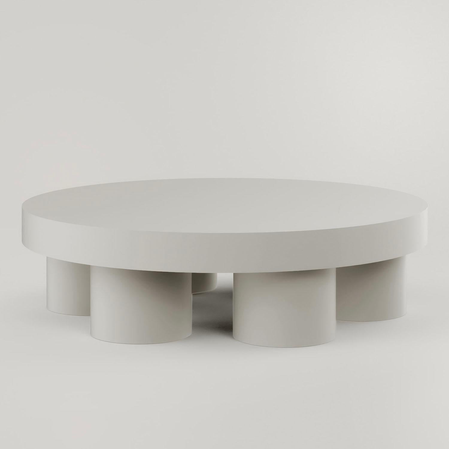 Contemporary Jesmonite coffee table - Pilotis Low Table by Malgorzata Bany.

Pilotis Low Table, a multifunctional statement piece crafted from Jesmonite. The latest addition to the ‘Pilotis’ range, the table encompasses the pure, clean aesthetic