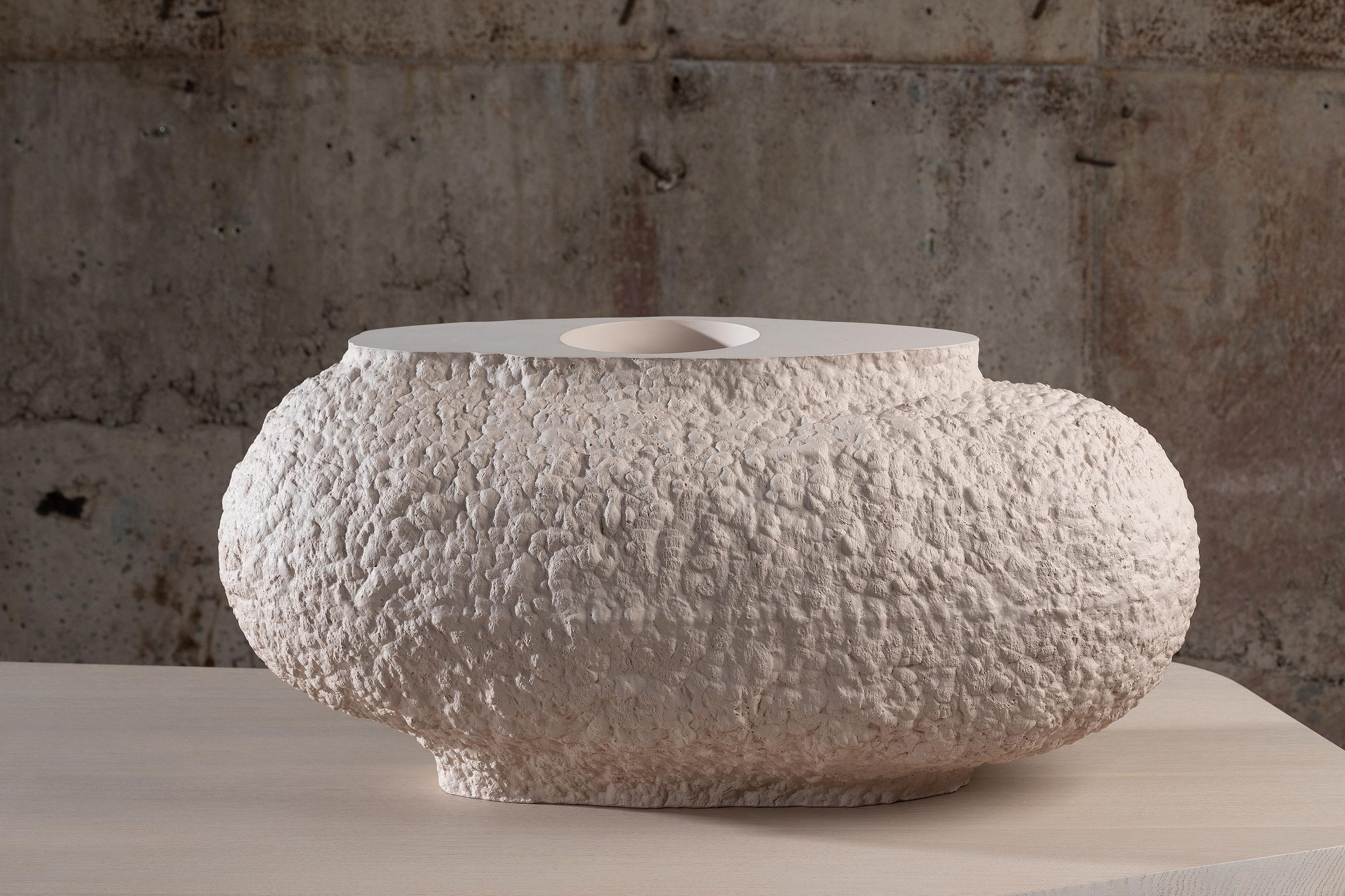 Contemporary Jesmonite Vessel - Acacia by Malgorzata Bany.

ACACIA vessel takes inspiration from daily cleansing rituals and the process of natural decay. The construction of these pieces is a very intuitive process of carving away the material and