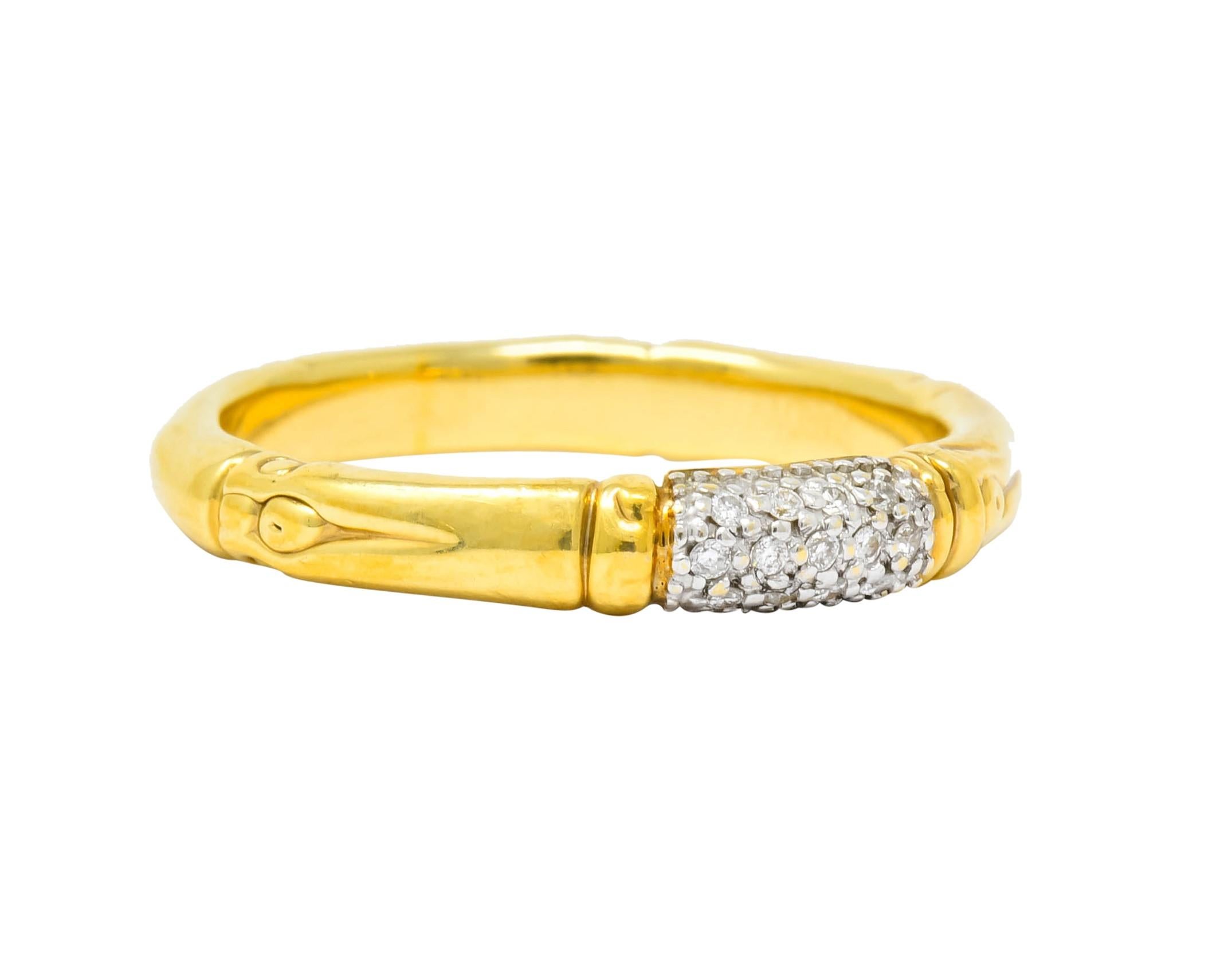 Yellow gold band ring designed with segmented bamboo motif throughout

Set to front with round brilliant cut diamonds, pavé set in a white gold, weighing approximately 0.13 carat total, eye-clean and white

From John Hardy's contemporary Bamboo