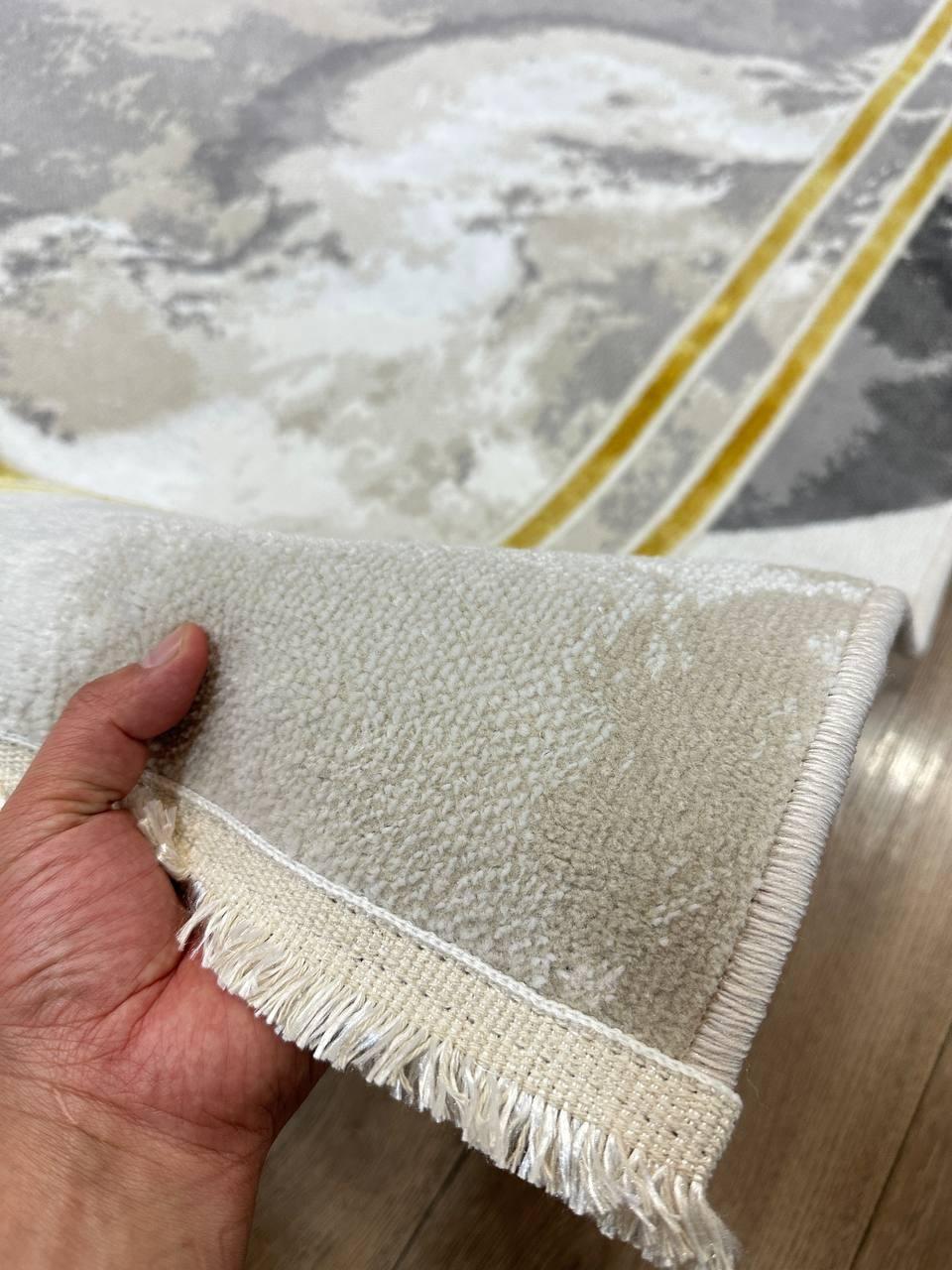 This stylish Kazakh modern rug features an abstract pattern and is machine-made from a blend of cotton and polyester. With its contemporary design and light weight, this rug adds a touch of modern elegance to any room.

Features:

Type: Rug
Shape: