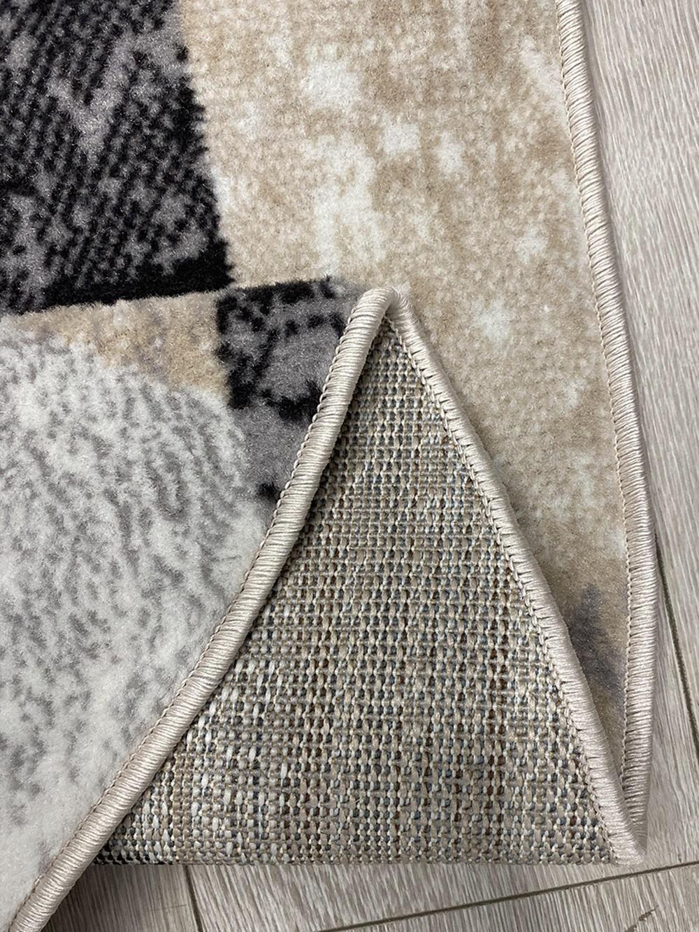 This contemporary Kazakh rug features a modern design with abstract and geometric patterns in an elegant oval shape. Machine-made from high-quality polypropylene, this lightweight rug comes in a versatile gray color.

Features:

Type: Rug
Shape: