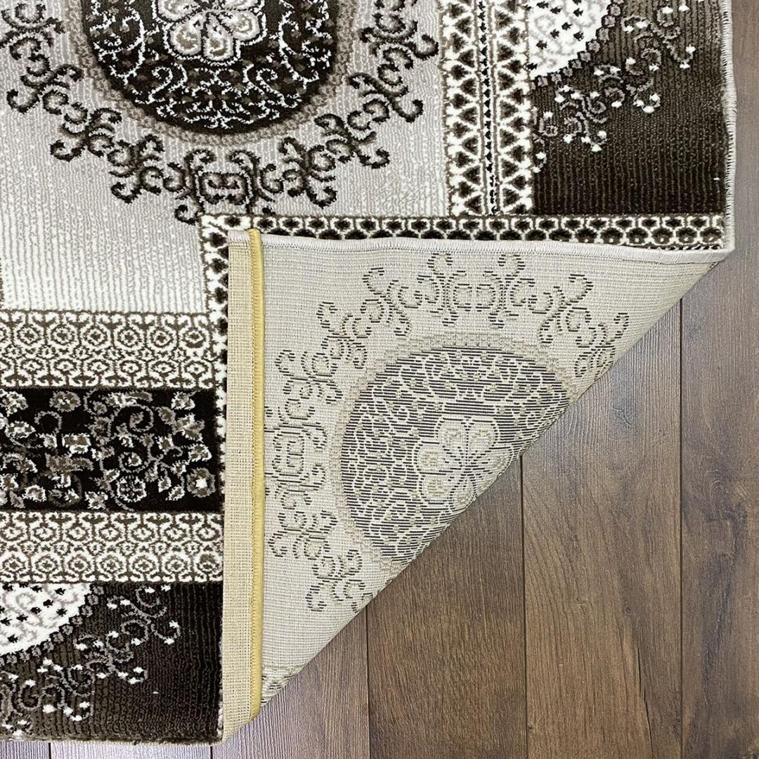 This contemporary Kazakh rug features a modern design with an abstract pattern, presented in a sleek rectangular shape. Machine-made from durable polypropylene, this lightweight rug is offered in a rich brown color.

Features:

Type: Rug
Shape: