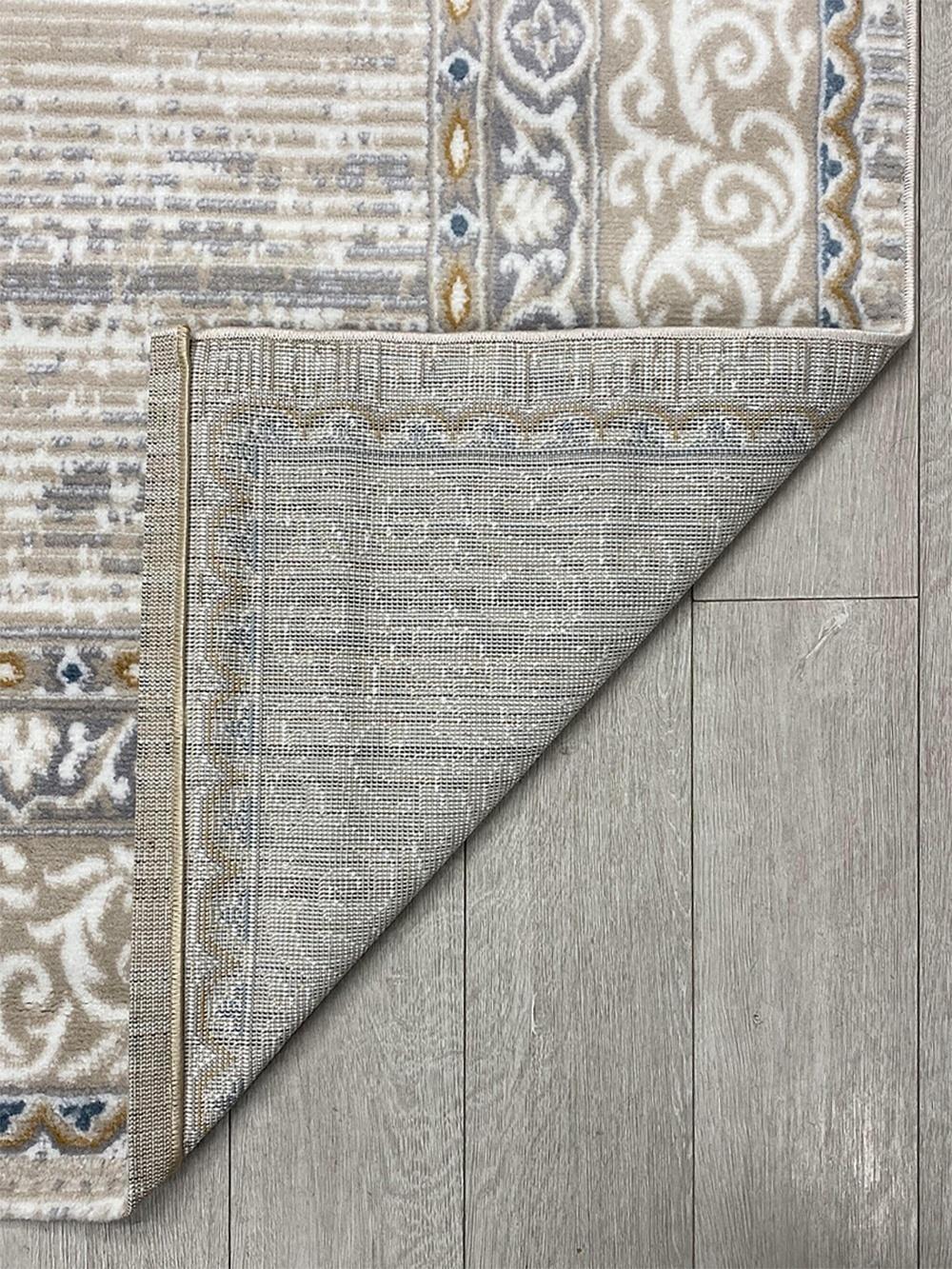 This striking contemporary Kazakh rug combines modern and classic Kazakh oriental ornaments, offering a sophisticated blend of traditional and modern design elements. Machine-made from a high-quality mix of cotton, polypropylene, and jute, this